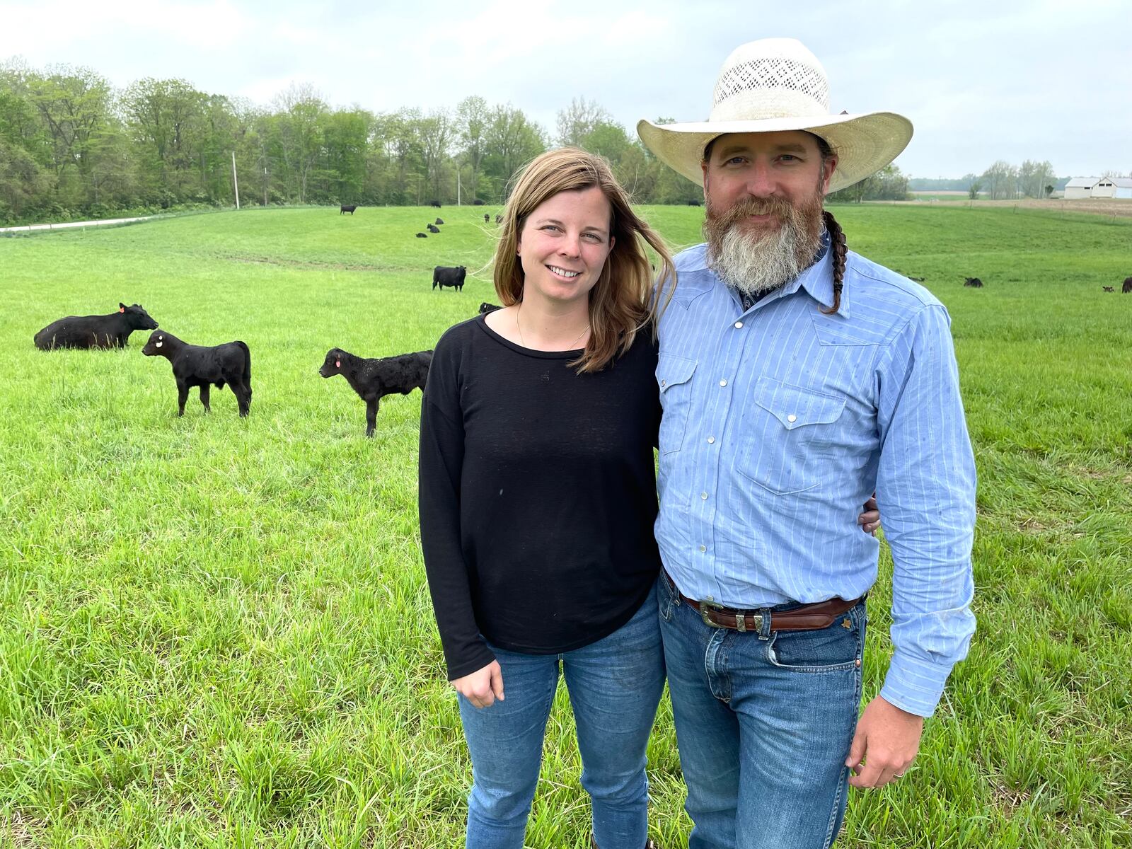 Honey Creek Beef is a closed herd cattle farm located at 6350 Addison-New Carlisle Road, just outside of Champaign County in New Carlisle. Pictured are owners Adam Frantz and his wife, Mia Grimes. NATALIE JONES/STAFF