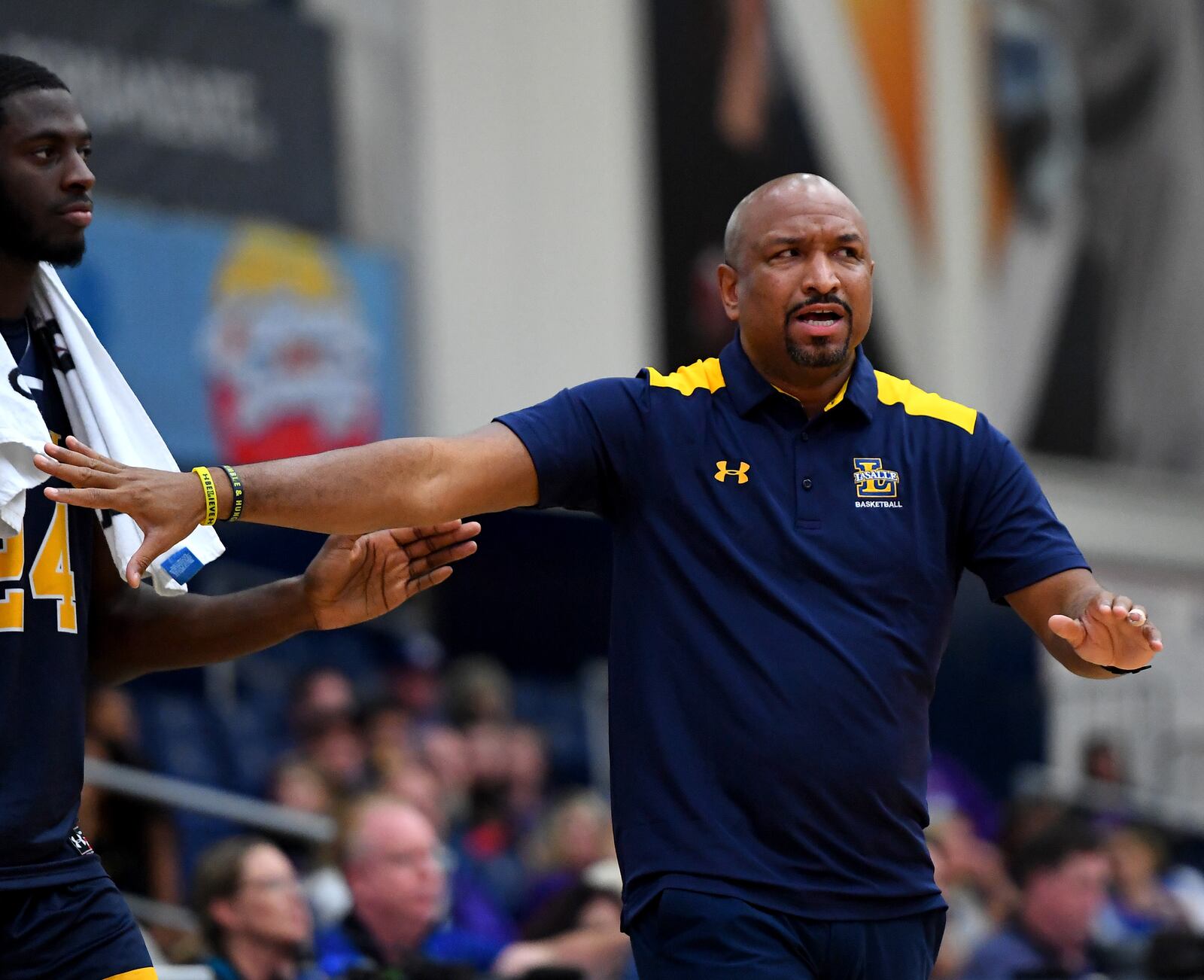 FULLERTON, CA - NOVEMBER 25:   Head coach Ashley Howard of the La Salle Explorers calls a play from the bench in the second half of the game against the Grand Canyon Lopes during the Wooden Legacy Tournament at Titan Gym on November 25, 2018 in Fullerton, California. (Photo by Jayne Kamin-Oncea/Getty Images)