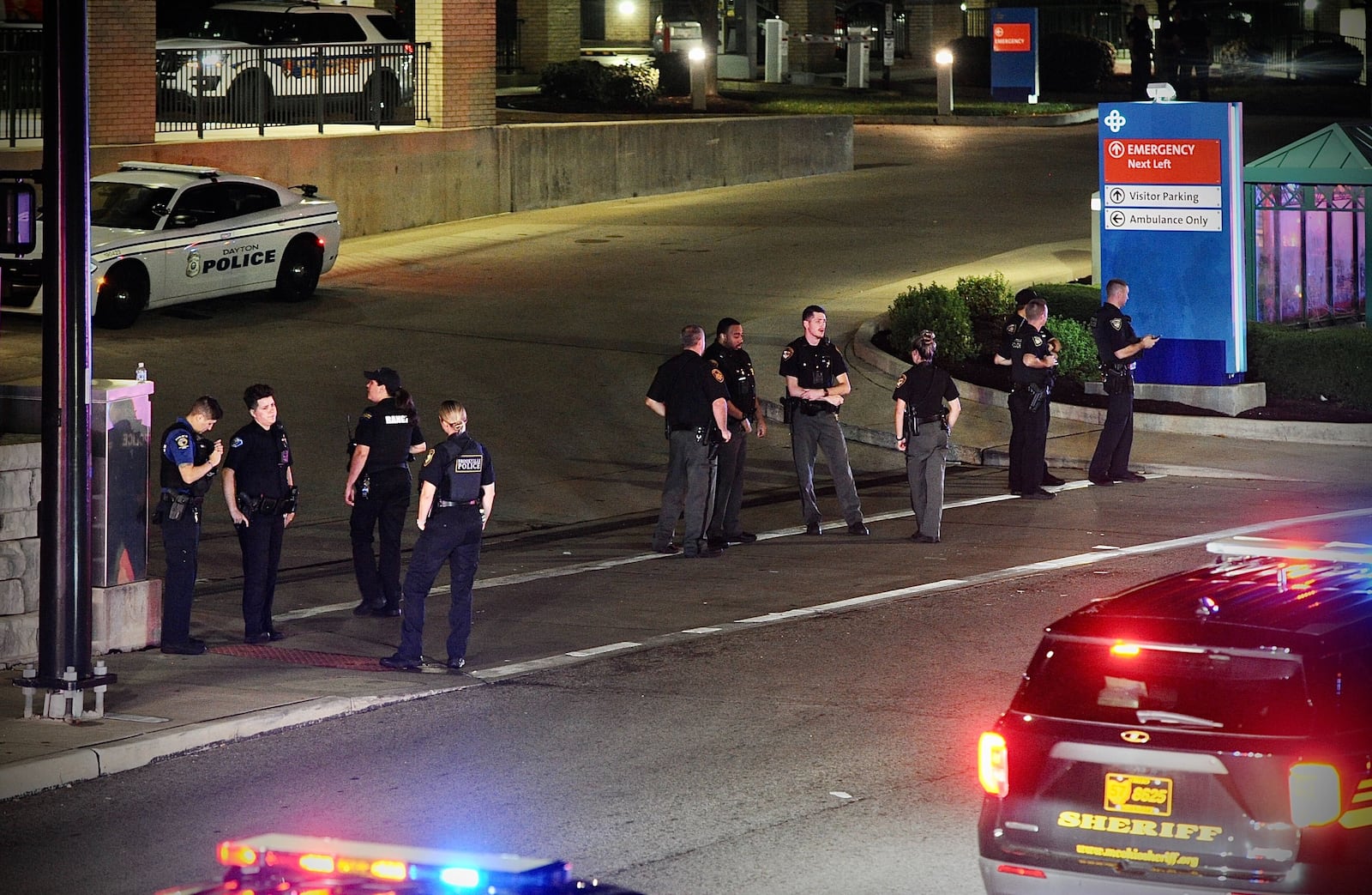 Law enforcement  blocking emergency room entrance off of Main Street at Miami Valley Hospital. MARSHALL GORBY \STAFF