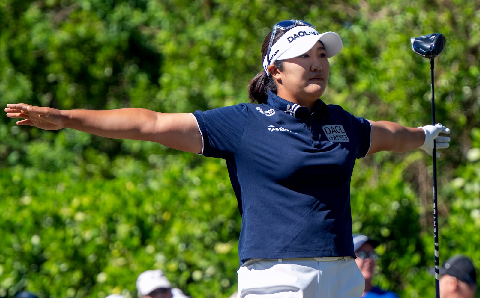 Hadrian Ryu gestures on the first tee during the first round of the LPGA CME Group Tour Championship golf tournament Thursday, Nov. 21, 2024, in Naples, Fla. (AP Photo/Chris Tilley)