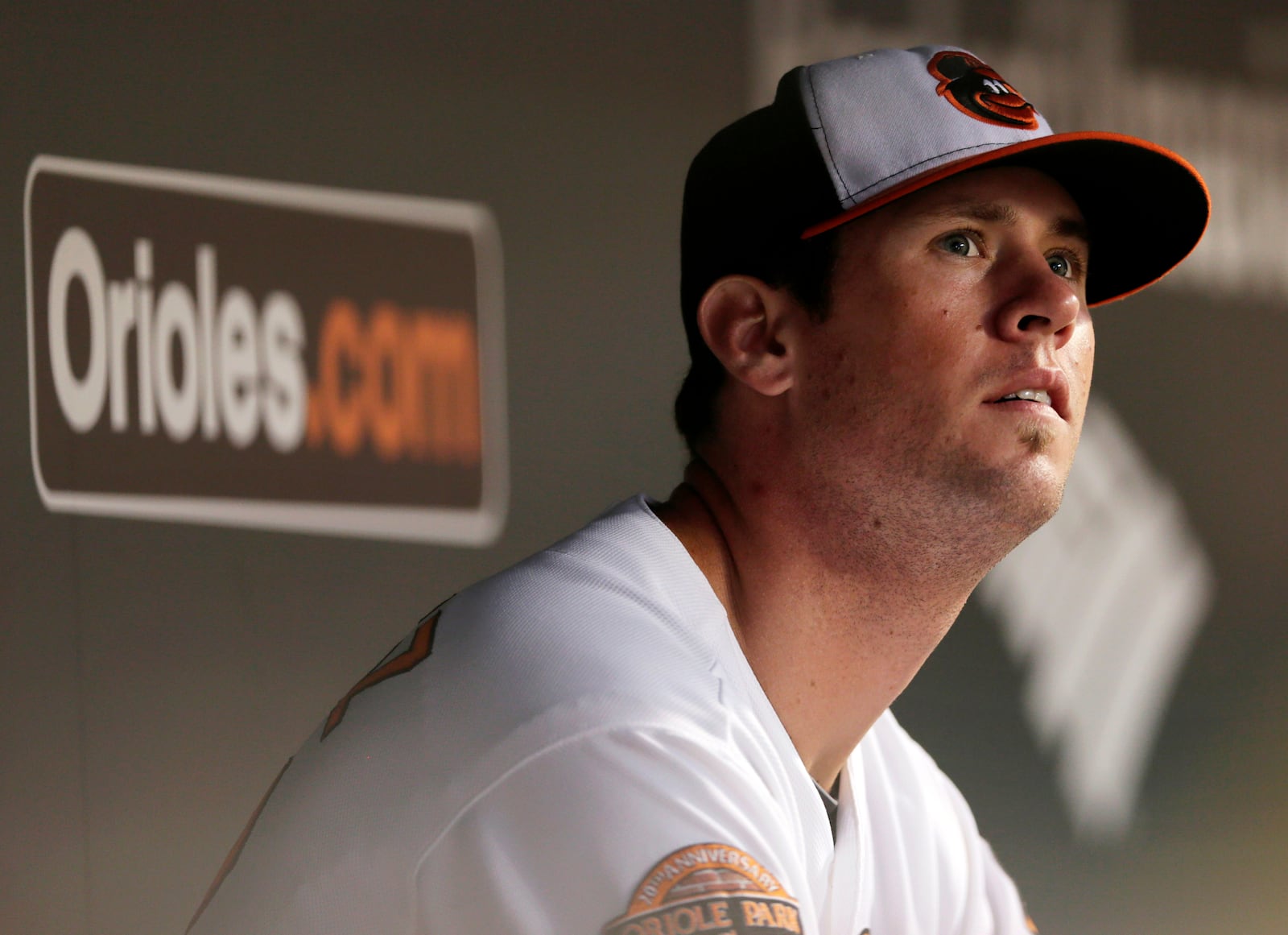 FILE - Baltimore Orioles starting pitcher Brian Matusz watches from the dugout after being removed from the baseball game against the Los Angeles Angels in the sixth inning in Baltimore, Tuesday, June 26, 2012. (AP Photo/Patrick Semansky, File)