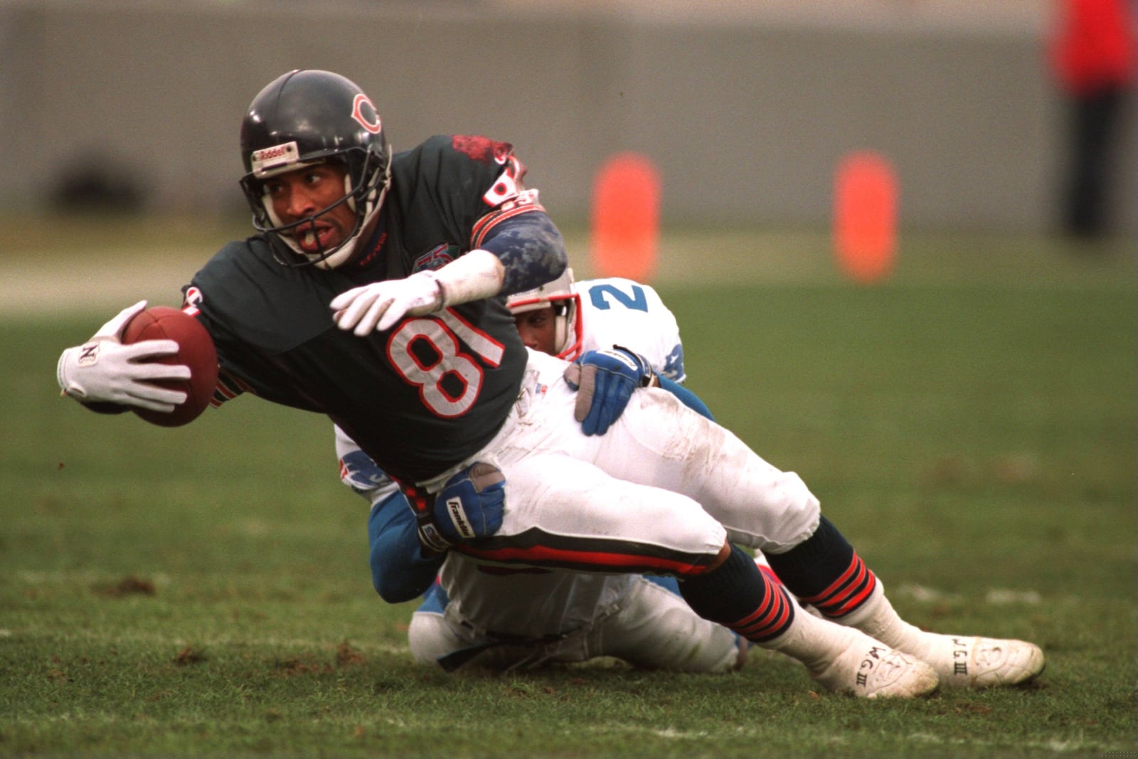 Chicago Bears receiver Jeff Graham lunges for extra yeards before being brought down by New England Patriots cornerback during the first quarter of a game at Soldier Field in Chicago in December 1994. GETTY IMAGES