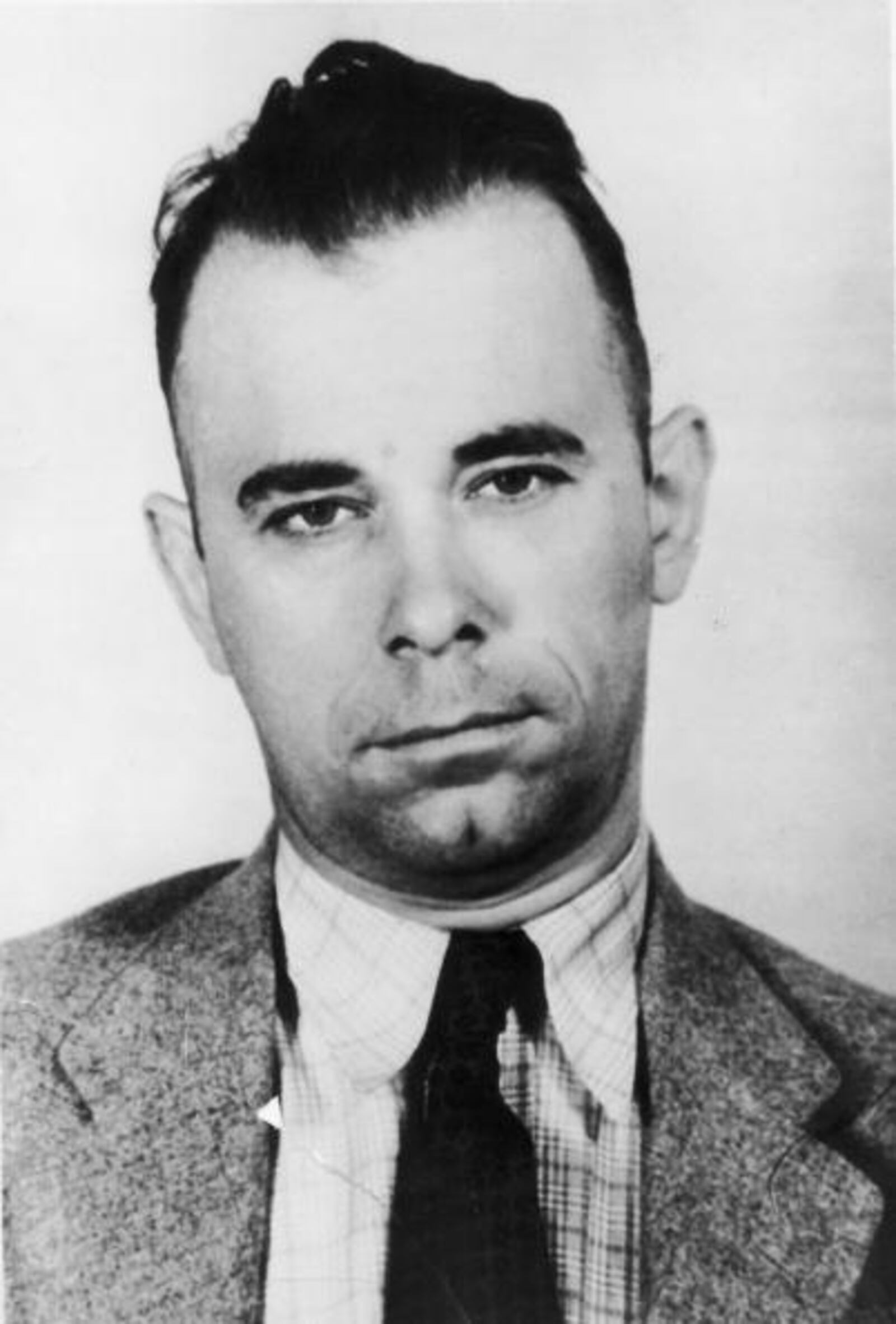 An American bank robber during the Depression, Dillinger escaped jail twice. Media reports dramatized Dillinger's exploits, which led to the creation of the FBI to combat organized crime.