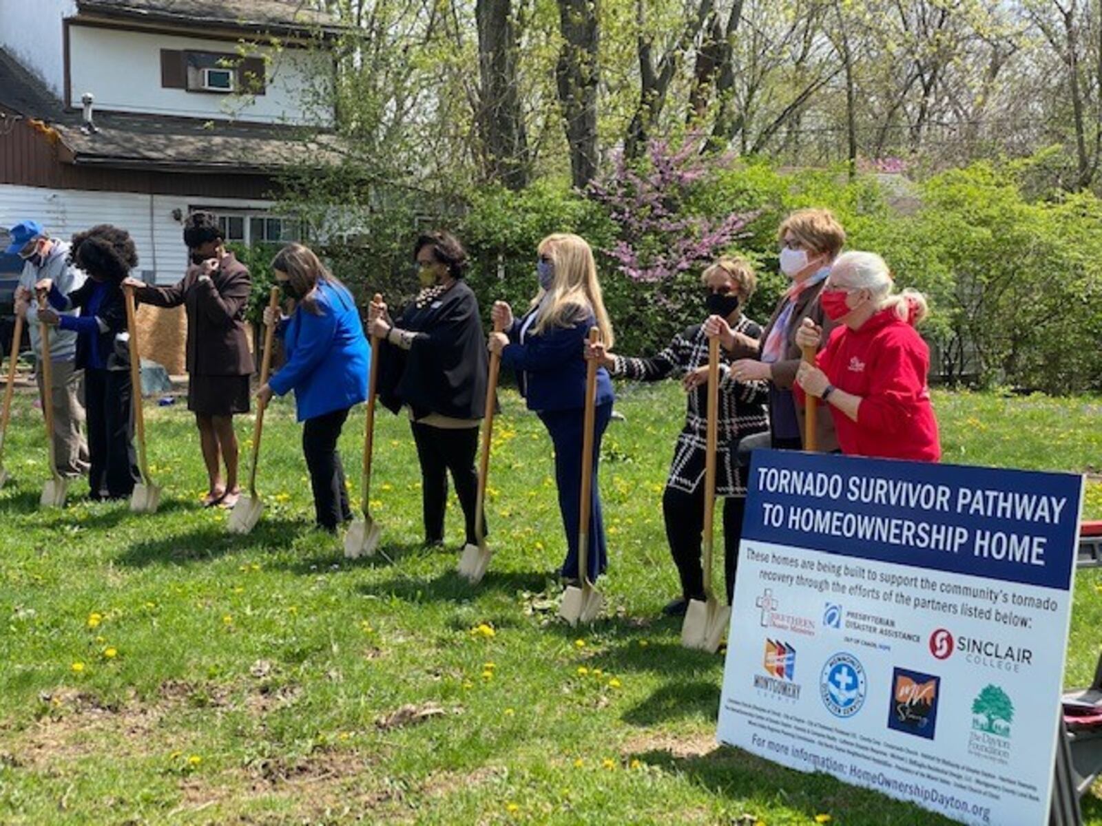 City leaders, county commissioners and community partners prepare to break ground on a new home for a family impacted by the Memorial Day tornadoes.