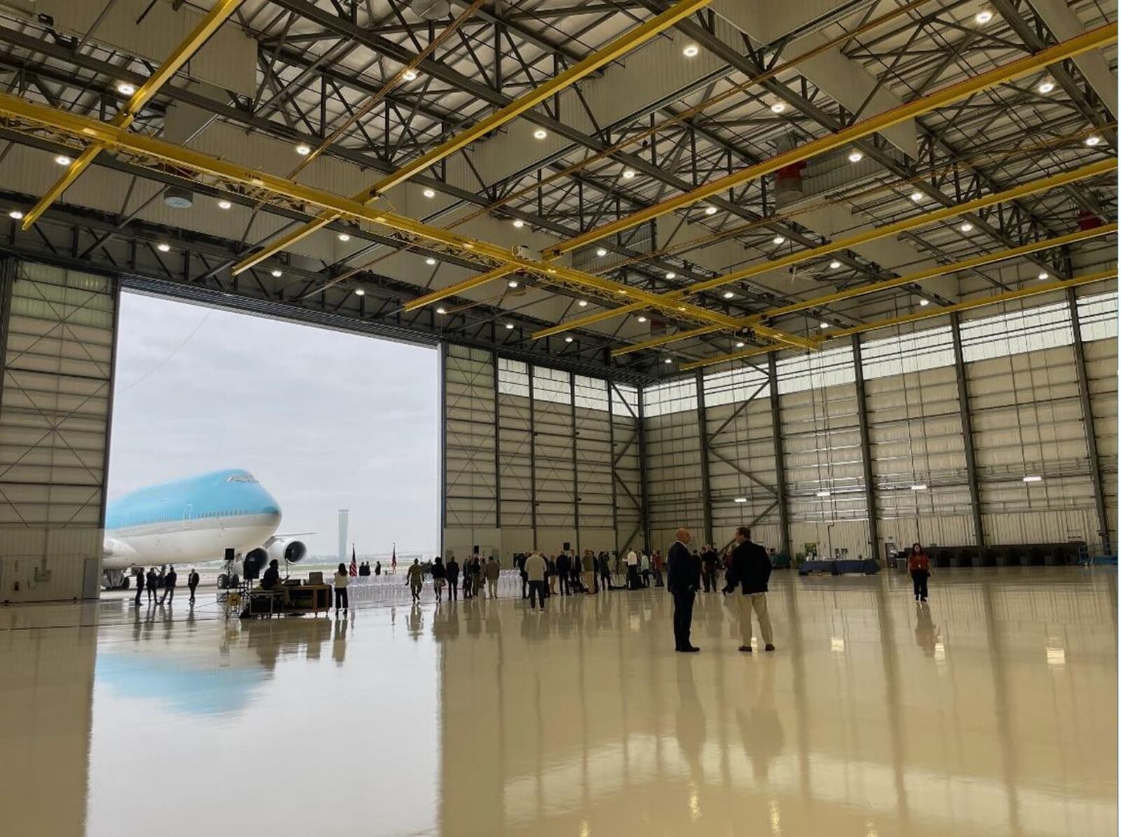 Sierra Nevada officials gather in their hangar near the Dayton International Airport. A $500,000 ED/GE grant is supporting construction that will lead to an estimated 200 new jobs for Montgomery County.