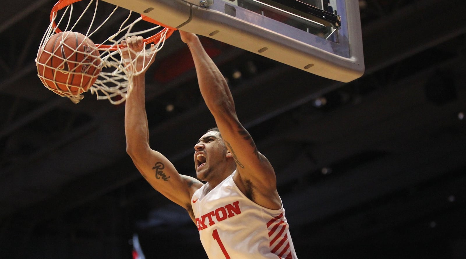 Dayton’s Obi Toppin dunks against Detroit last season at UD Arena. The University of Dayton is among a group of Ohio schools trying to prevent Ohio’s sportgs gambling laws to allow gambling on college games. David Jablonski/Staff