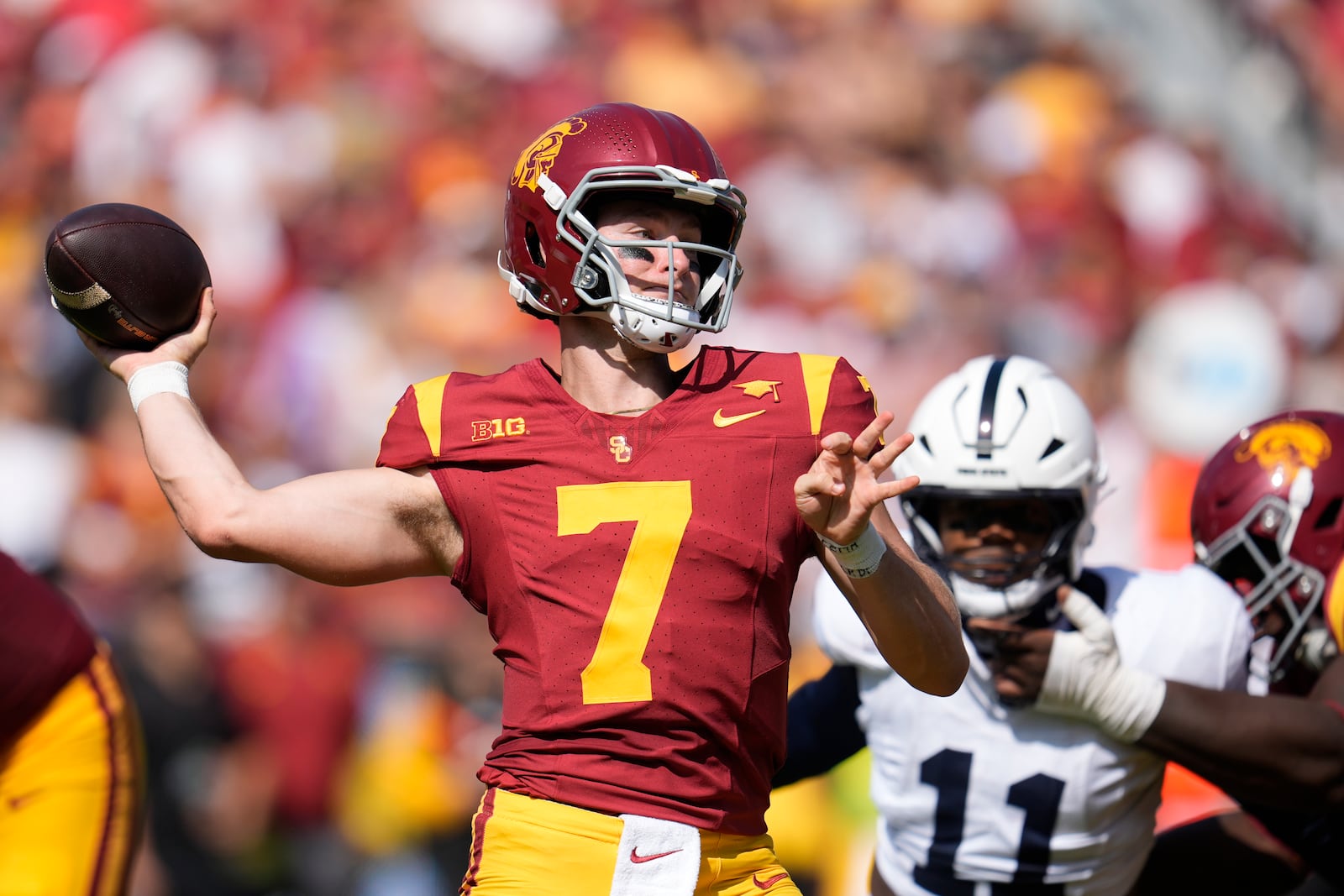 Southern California quarterback Miller Moss (7) throws a pass during the first half of an NCAA college football game against Penn State, Saturday, Oct. 12, 2024, in Los Angeles. (AP Photo/Marcio Jose Sanchez)