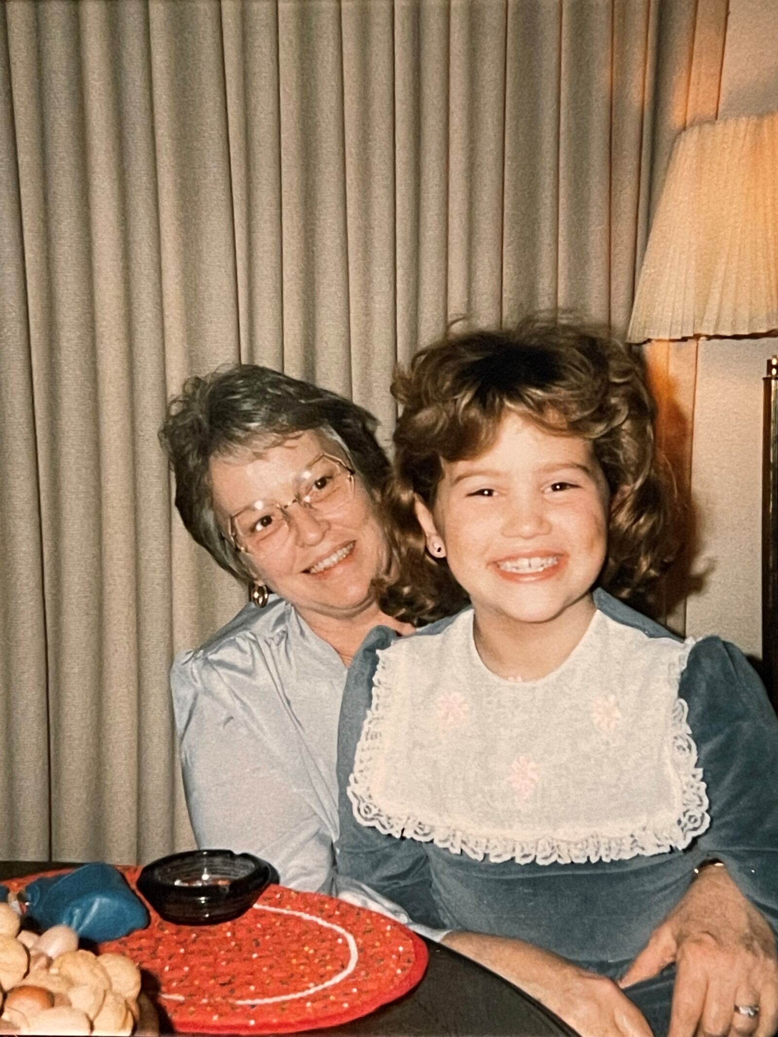 Karen Huelsman's daughter Erika on Grandma Arlene's lap.