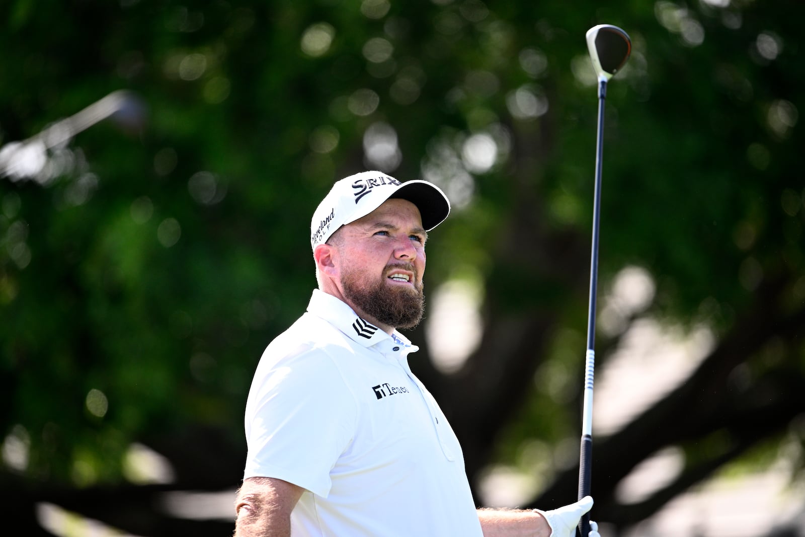 Shane Lowry, of Ireland, reacts after hitting his tee shot on the first hole during the third round of the Arnold Palmer Invitational at Bay Hill golf tournament, Saturday, March 8, 2025, in Orlando, Fla. (AP Photo/Phelan M. Ebenhack)