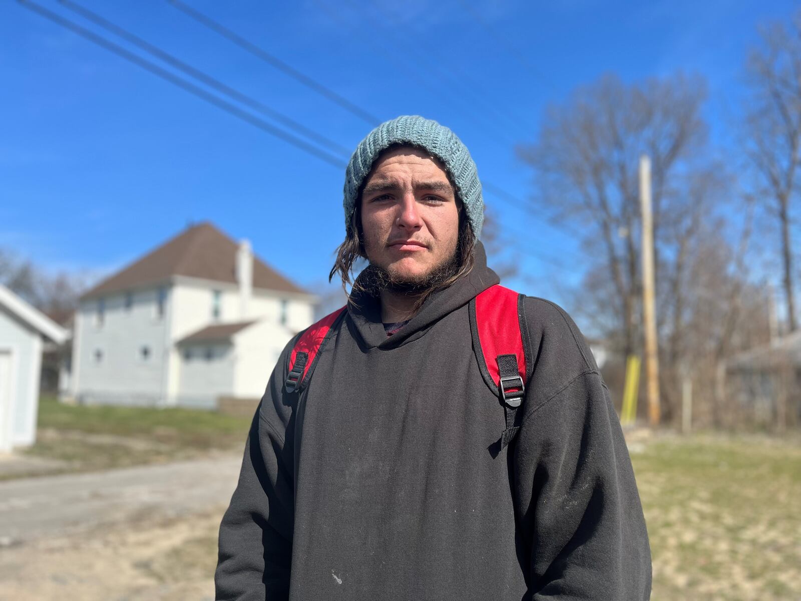 Jordan Trent, 23, says he survived a house fire on the 500 block of Broadway Street that resulted in officials finding five bodies.  CORNELIUS FROLIK / STAFF