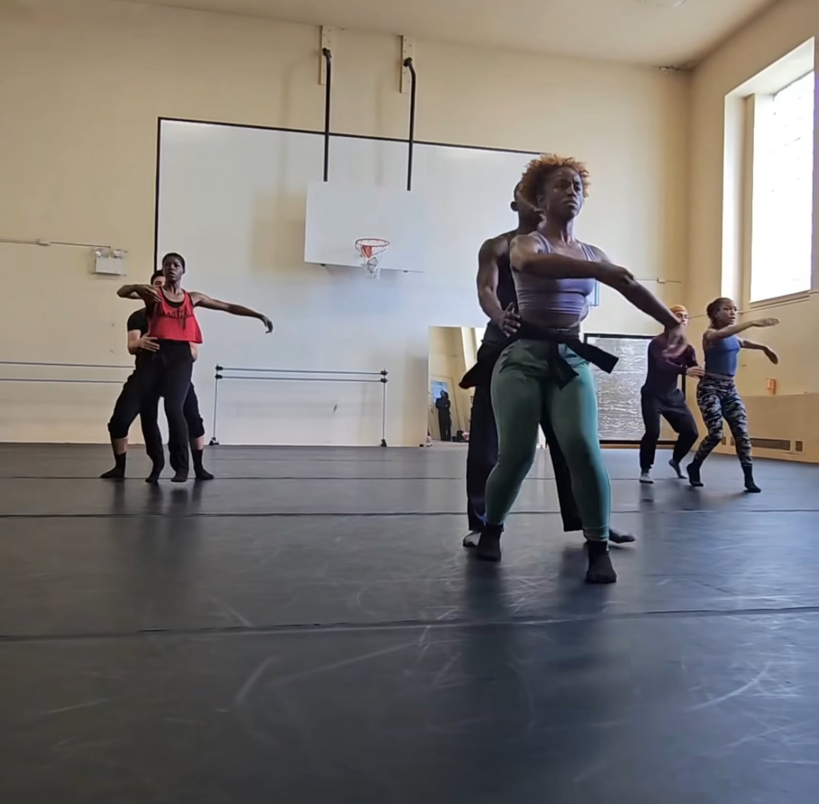 Qarrianne Blayr (in red) rehearsing at The Joyce while on tour in New York.