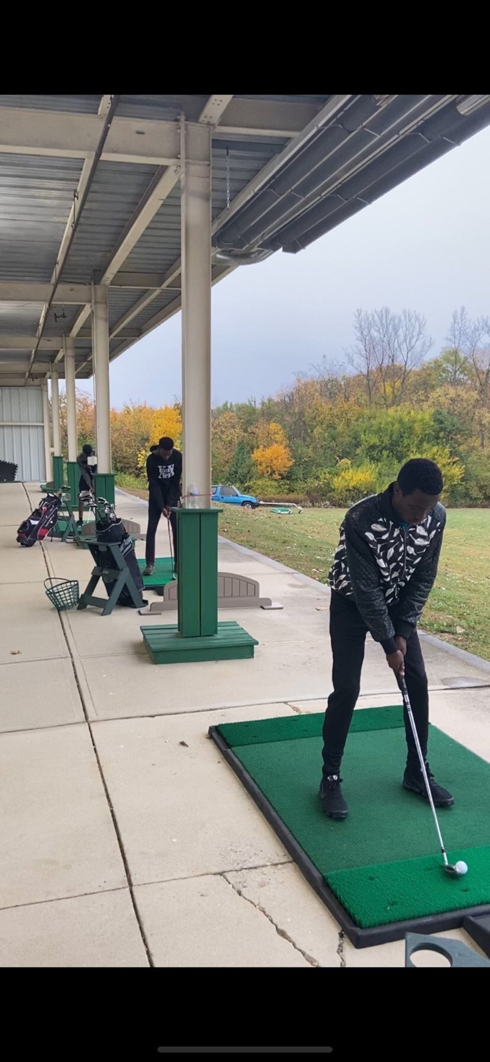 Wilberforce golfers (right to left) Ngabo Rubibi, Patrick Rukundo and  Yves Tuyishima at driving range. CONTRIBUTED