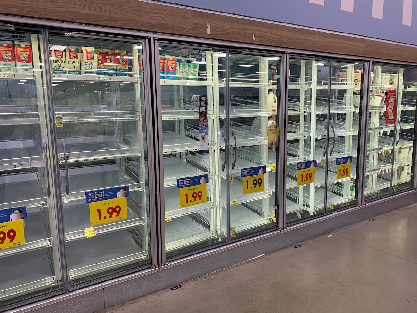 PHOTOS: Long lines, empty shelves at local grocery stores