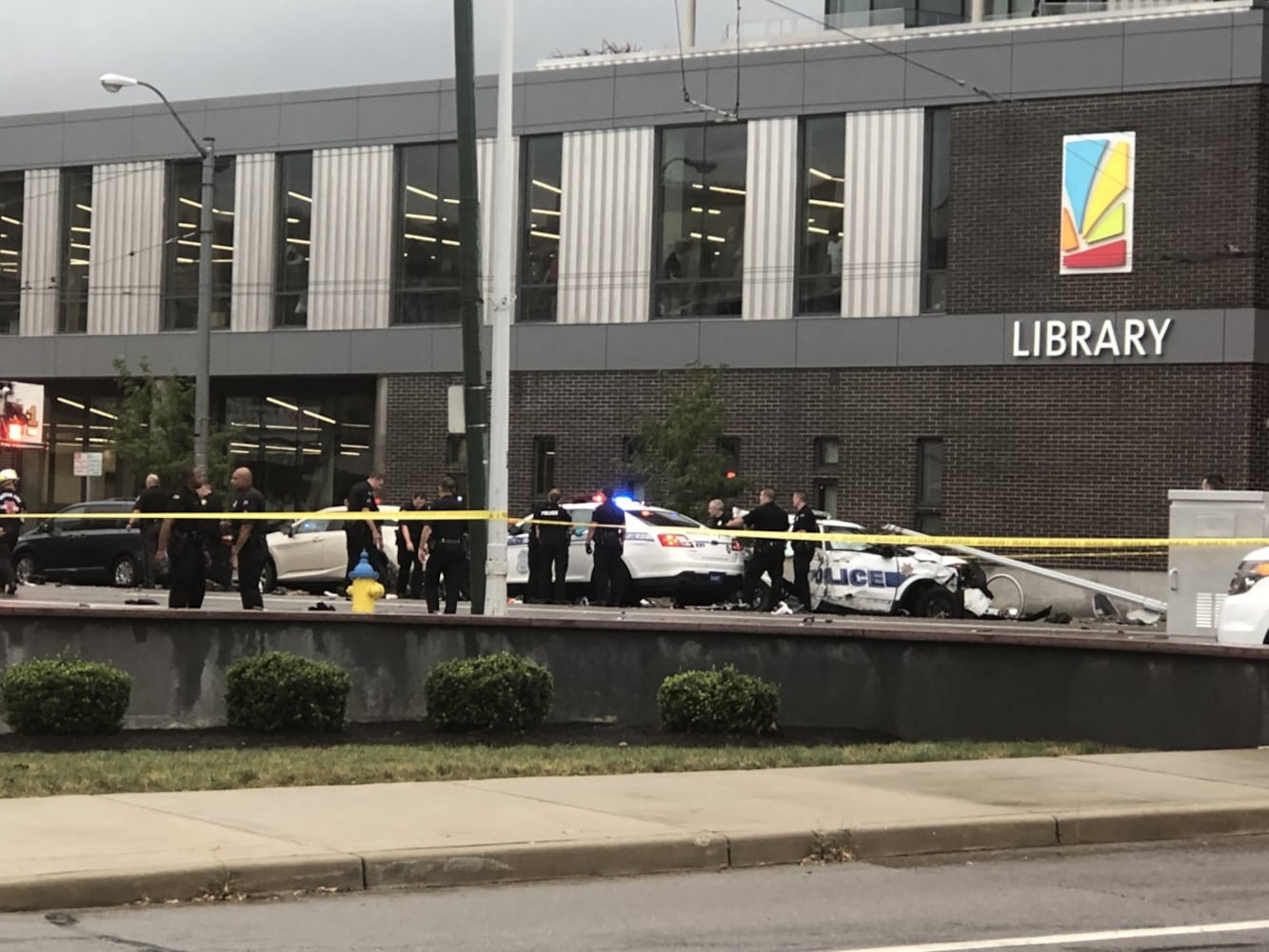 Police cruisers involved in accident near Main Library