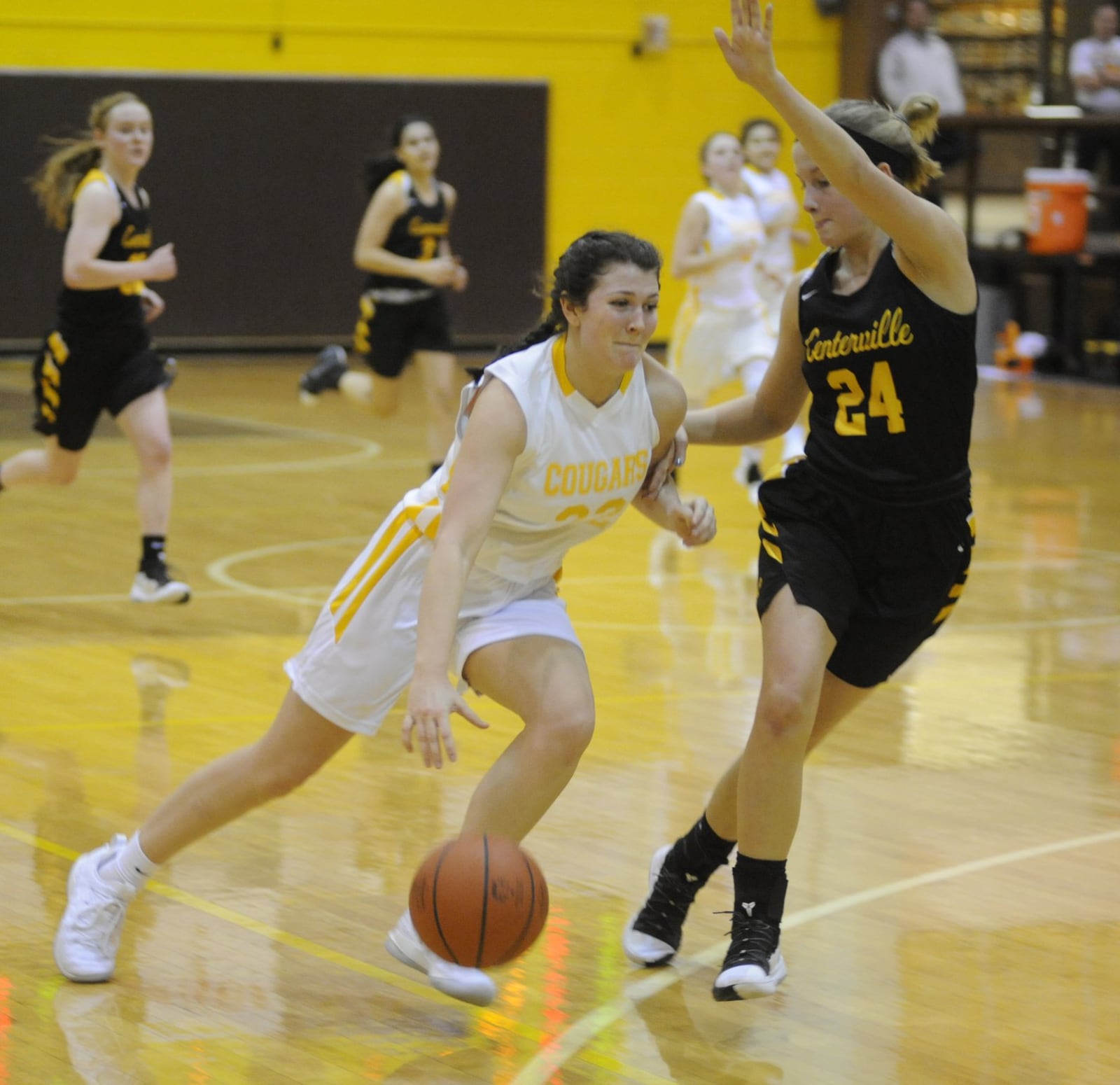 Kenton Ridge’s Mallery Armentrout (with ball) is confronted by Centerville’s Kelsey George. Centerville defeated host Kenton Ridge 61-46 in a girls high school basketball game on Thursday, Jan. 3, 2019. MARC PENDLETON / STAFF