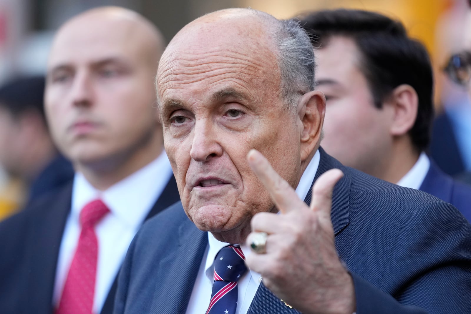 Former New York City Mayor Rudy Giuliani speaks to the media as he leaves court in New York, Thursday, Nov. 7, 2024. (AP Photo/Seth Wenig)