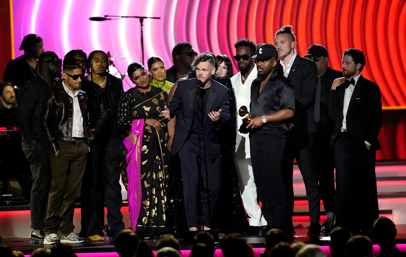 Elevation Worship and Maverick City Music accept the award for best contemporary christian music album for "Old Church Basement" at the 64th Annual Grammy Awards on Sunday, April 3, 2022, in Las Vegas. Elevation Worship performs Friday, Aug. 12 at the Nutter Center. (AP Photo/Chris Pizzello)