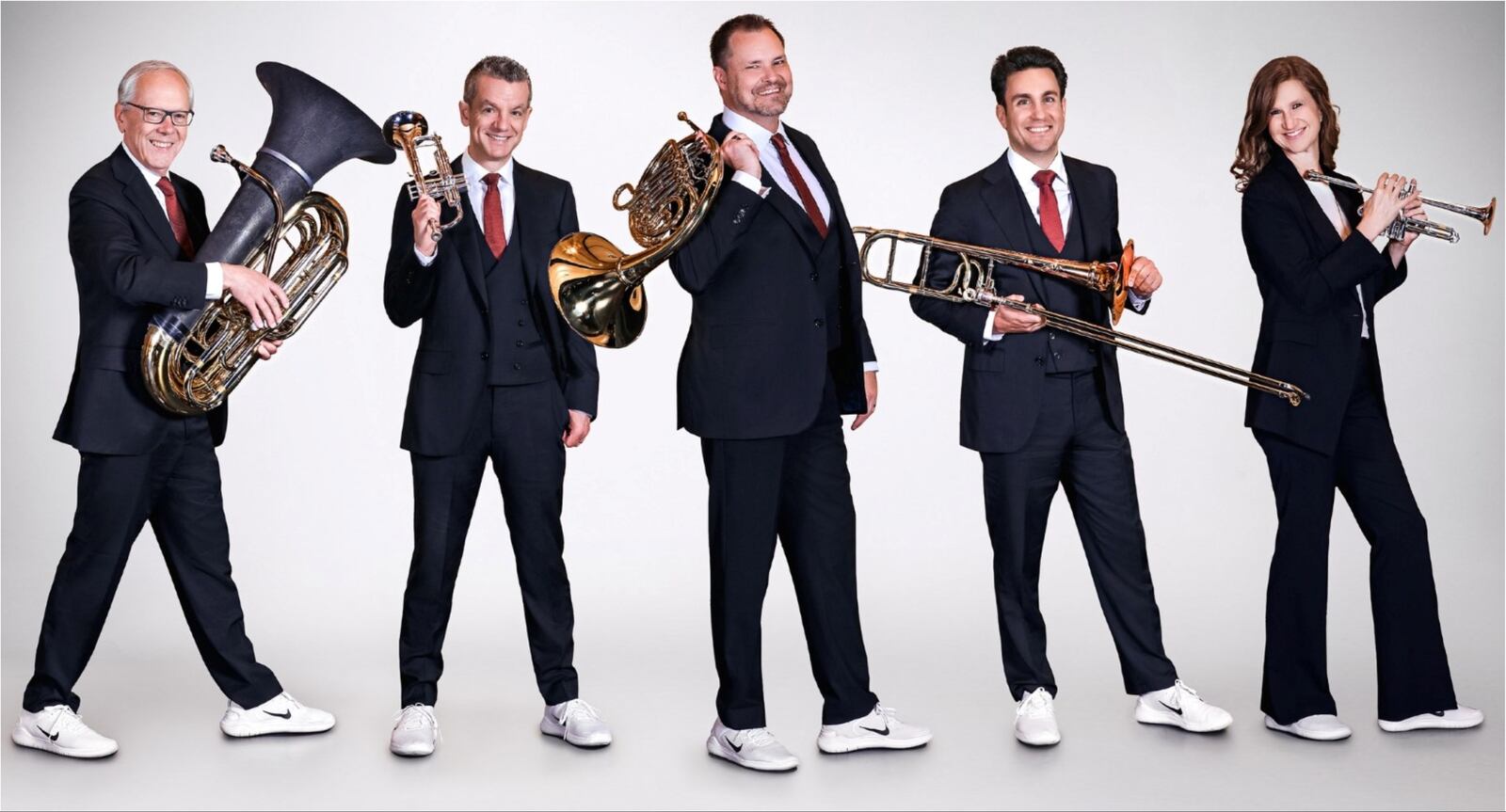 Charles Daellenbach (left to right), Joe Burgstaller, Jeff Nelson, Achilles Liarmakopoulos and Ashley Hall-Tighe of Canadian Brass, which formed in Toronto in 1970, joins the Dayton Philharmonic Orchestra for a Holiday Pops concert at the Schuster Center in Dayton on Saturday, Dec. 2.