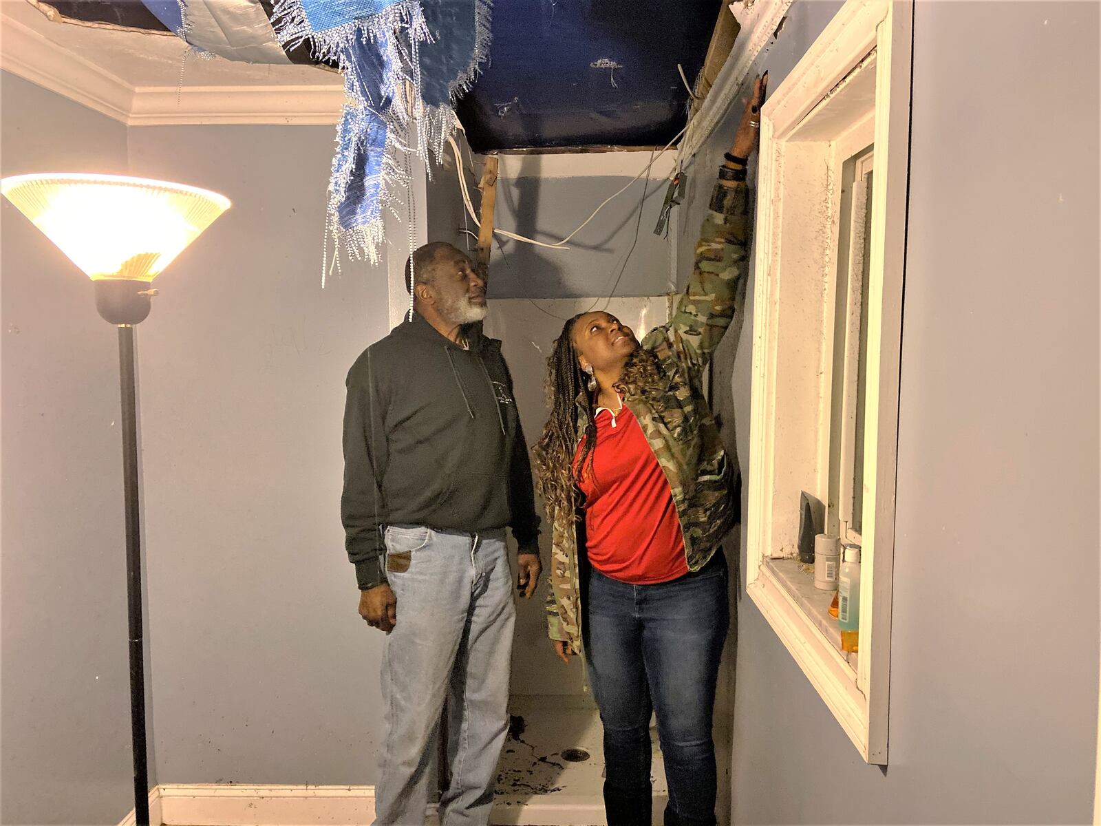 Father and daughter Wayne and Tosha Johnson said their tornado-damaged Trotwood home is the latest challenge for the family. "Lord, if you're testing (us), it's good. We're good, I don't need anymore," Wayne Johnson said, chuckling. Still, despite all that their family has gone through, don't refer to the Johnsons and victims, not even tornado victims. ISMAIL TURAY/STAFF