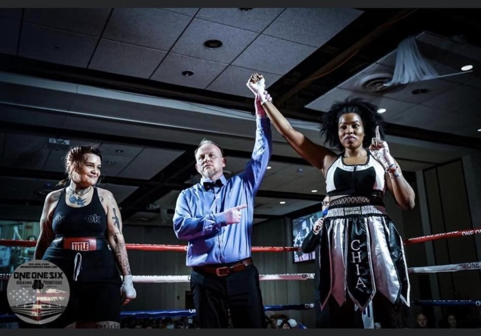 Chia Fei Asbury – the Belmont High and Sinclair Community College grad who lives in Kettering – hand is raised in victory after a TKO stoppage in just 12 seconds of the first round of her heavyweight bout against Sierra Ramsey in Hopkinsville, Ky., in January of last year. It was Asbury’s first victory as a professional fighter. CONTRIBUTED