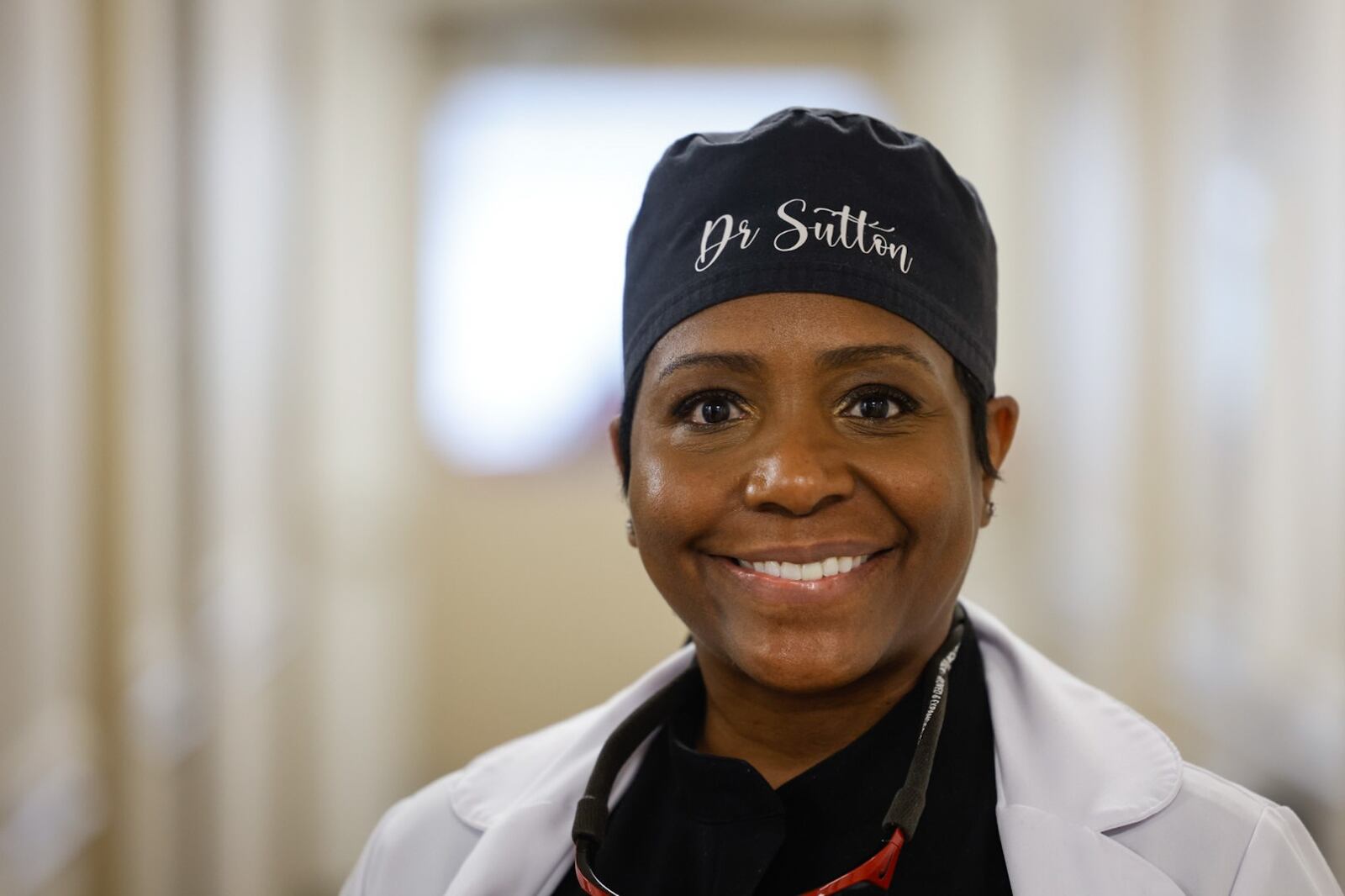 Good Neighbor House dentist Dr. Shanetta Sutton received an award for her work in helping uninsured people get dental care. JIM NOELKER/STAFF