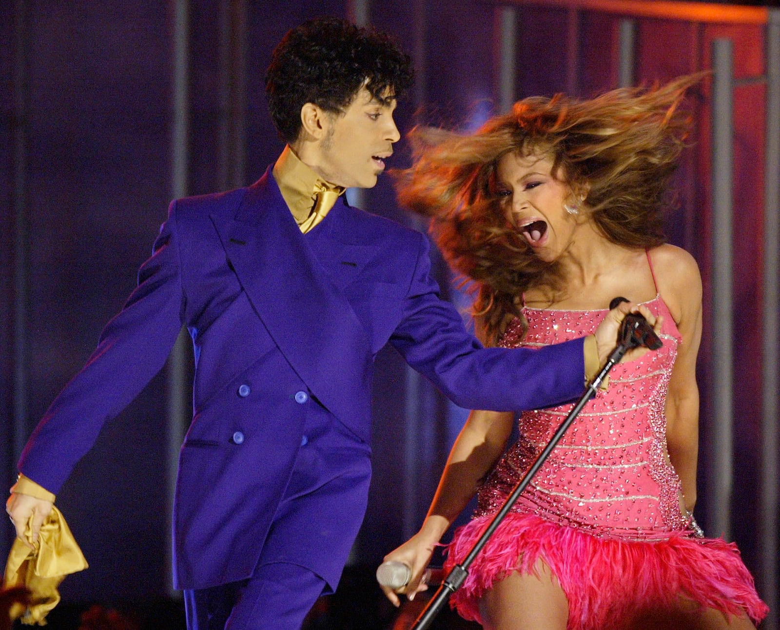 FILE- Beyonce, right, and Prince perform during the 46th Annual Grammy Awards in Los Angeles on Feb. 8, 2004. (AP Photo/Kevork Djansezian, File)