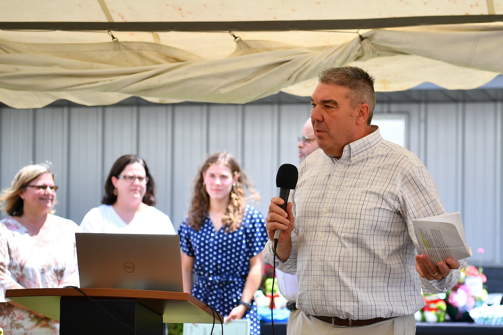 Former Vandalia-Butler schools superintendent Brad Neavin speaks at Kids Read Now's 10th anniversary celebration earlier this summer.