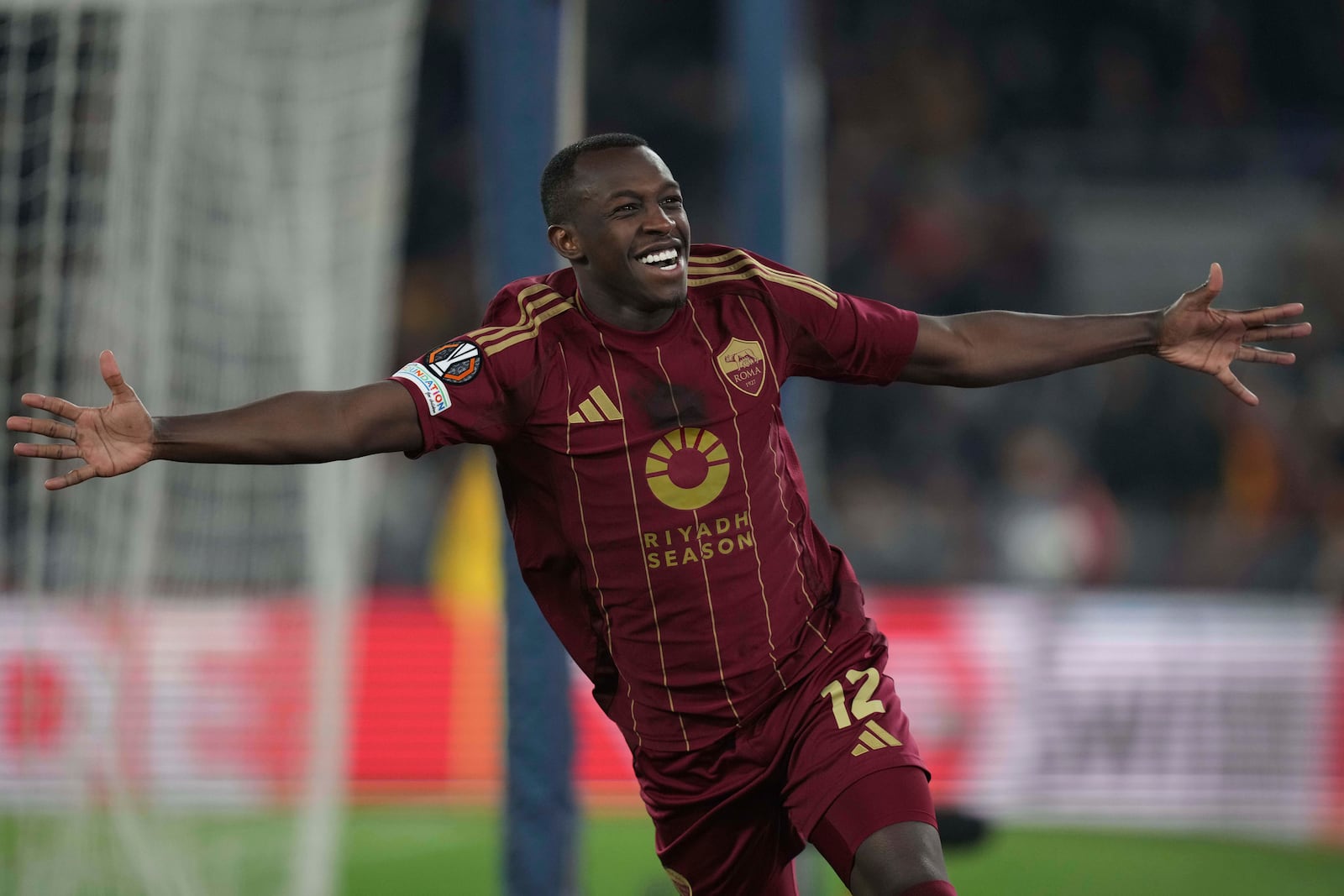 Roma's Saud Abdulhamid celebrates after scoring his side's second goal during the Europa League Soccer match between Roma and Braga at Rome's Olympic stadium, Thursday, Dec. 12, 2024. (Alfredo Falcone/LaPresse via AP)