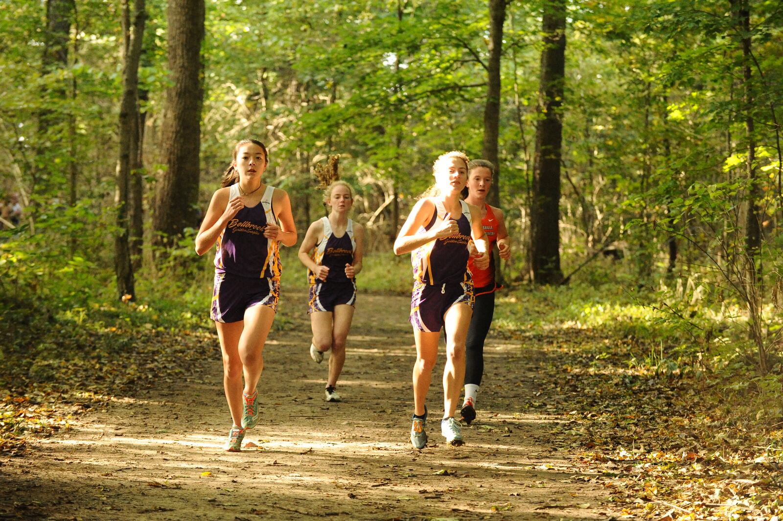 Bellbrook’s Minami Ford (L), Emily Pelfrey (M) and Elise Kemper (R) are among the Eagles who have propelled the girls team to the No. 5 ranking in the Division II state poll. Contributed / Greg Billing