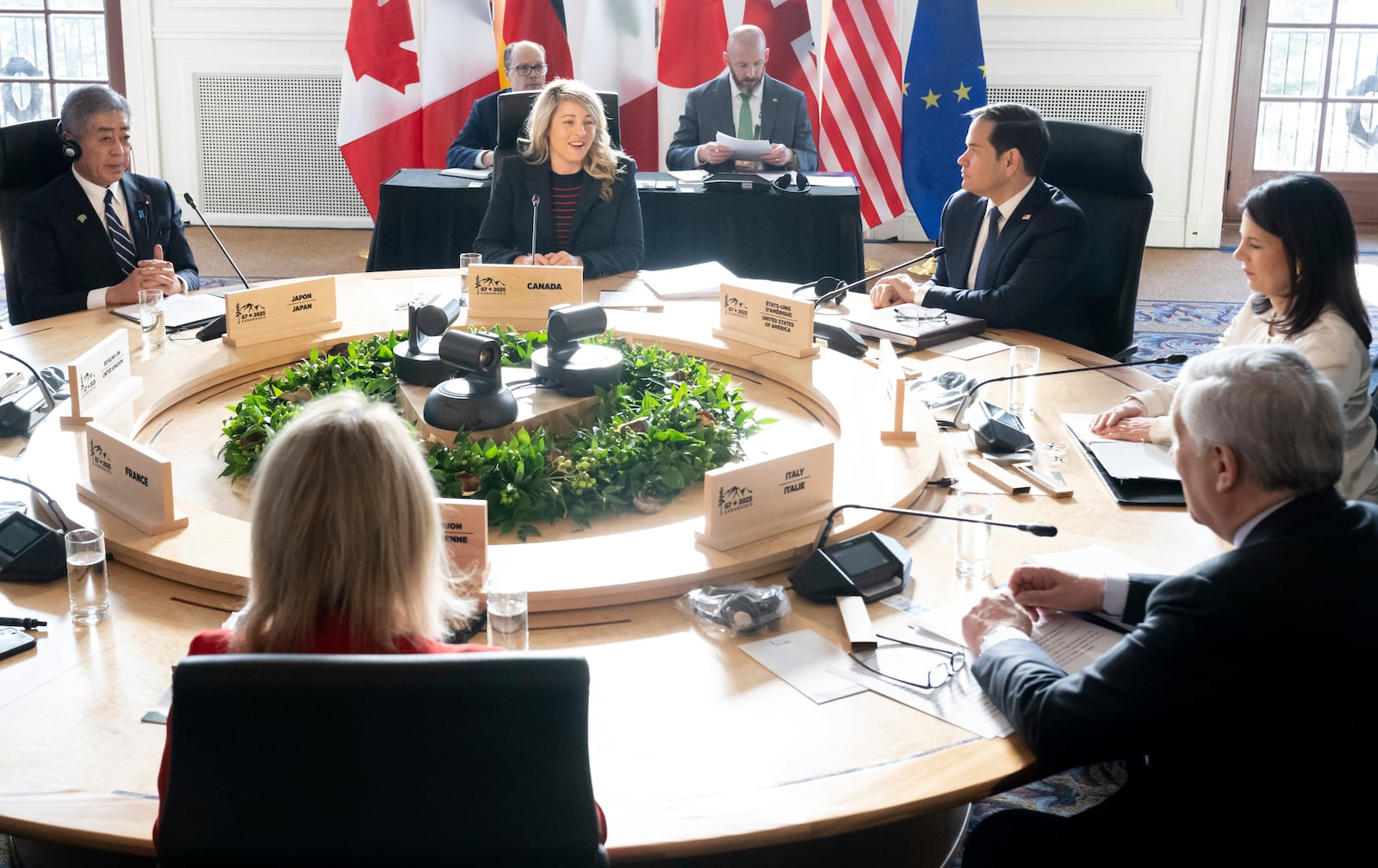 From L to R, Japanese Foreign Minister Iwaya Takeshi, Canadian Foreign Minister Melanie Joly, U.S. Secretary of State Marco Rubio, German Foreign Minister Annalena Baerbock, Italian Foreign Minister Antonio Tajani and EU foreign policy chief Kaja Kallas attend the G7 foreign ministers meeting in La Malbaie, Quebec, Thursday March 13, 2025. (Saul Loeb/Pool via AP)