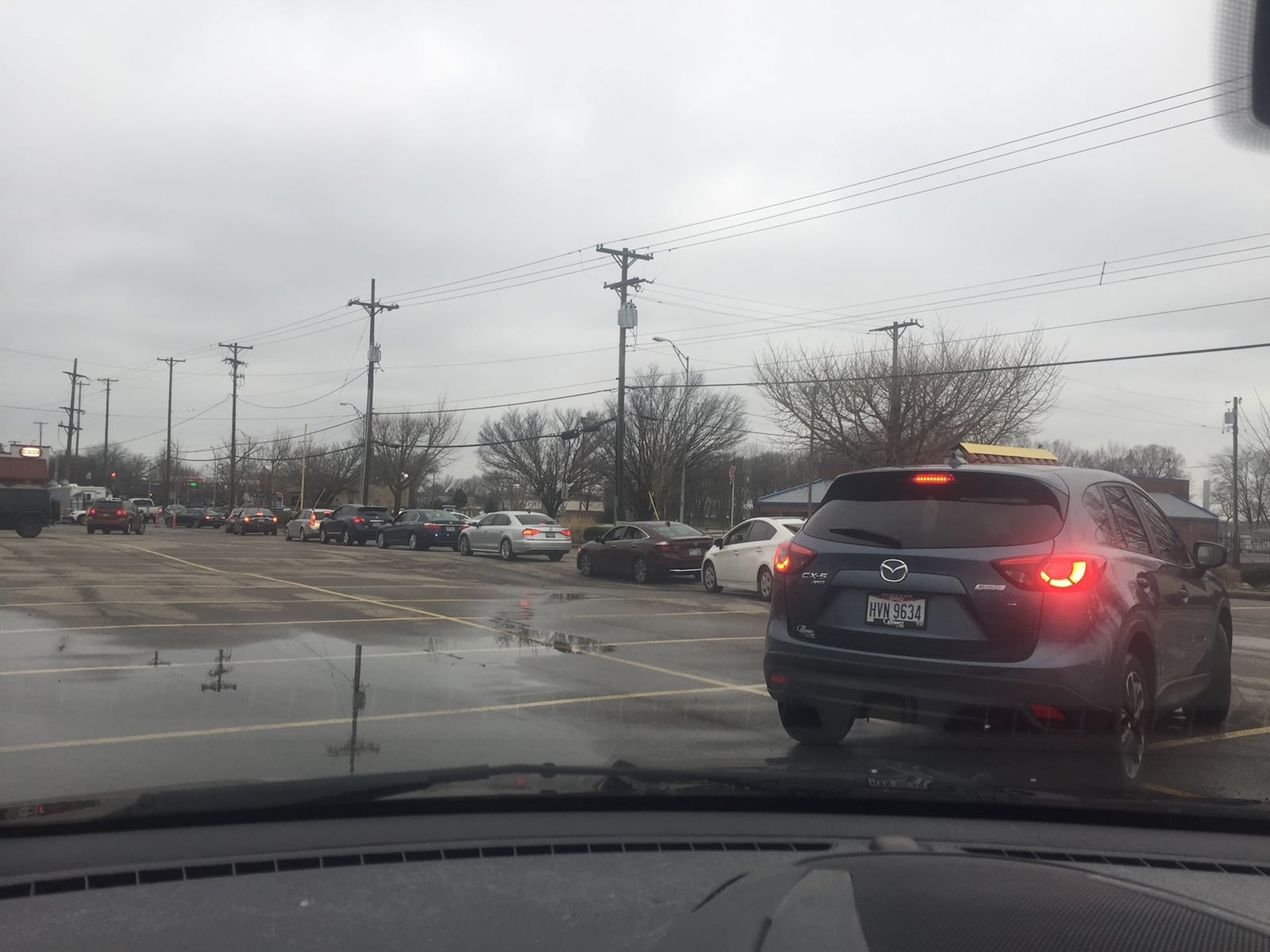 Cars line up to pick up El Meson carryout meals in late March. CONTRIBUTED/ALEXIS LARSEN