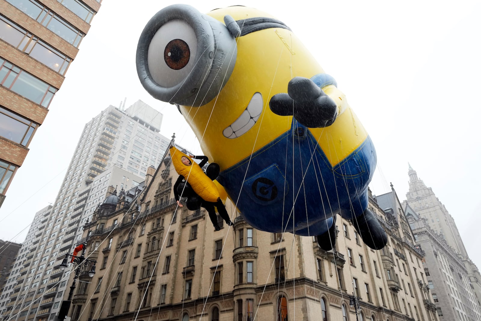 The Stuart the Minion balloon floats in the Macy's Thanksgiving Day Parade on Thursday, Nov. 28, 2024, in New York. (Photo by Charles Sykes/Invision/AP)