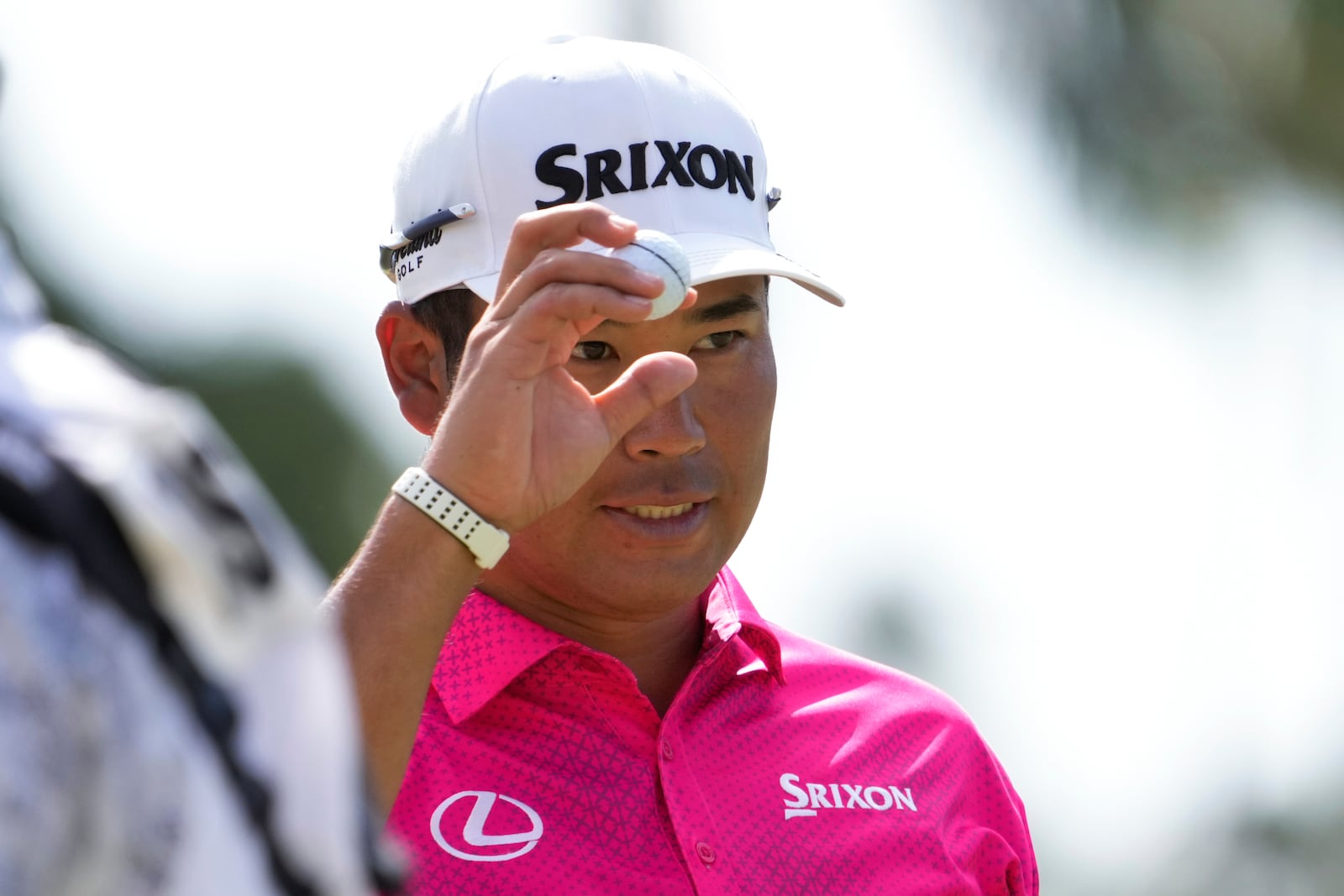 Hideki Matsuyama reacts to hitting a birdie putt on the third green during the third round of the Sony Open golf tournament, Saturday, Jan. 11, 2025, at Waialae Country Club in Honolulu. (AP Photo/Matt York)