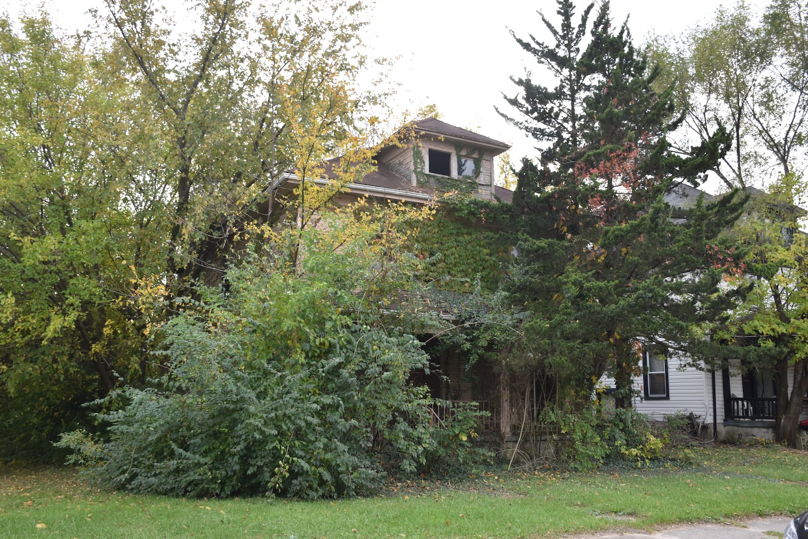 A home in West Dayton that is slated for demolition. CORNELIUS FROLIK / STAFF