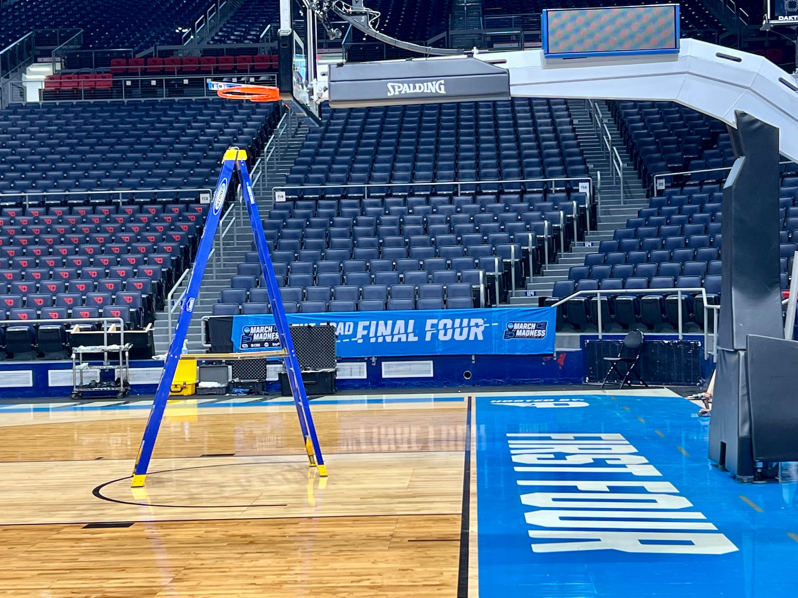 Staff at the University of Dayton Arena installed the court ahead of Sunday evening’s NCAA Championship bracket selection events.