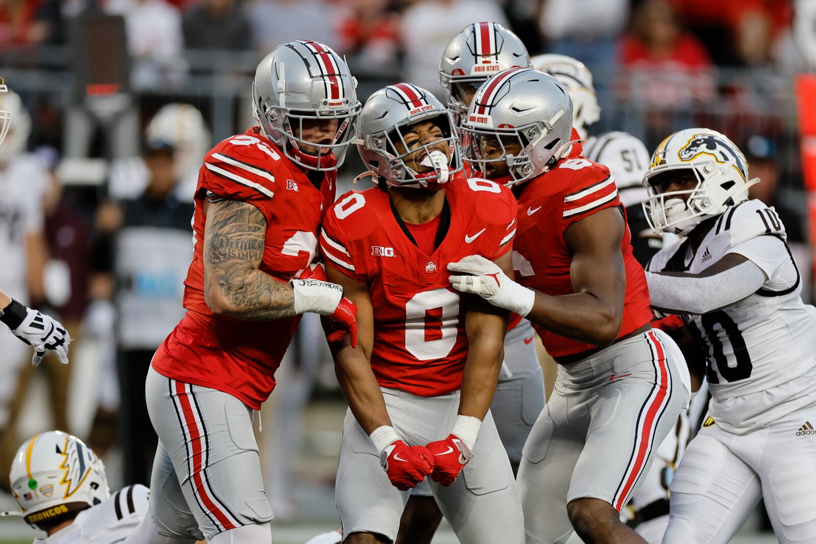 FILE - Ohio State linebacker Cody Simon (0) celebrates after his sack against Western Michigan during the first half of an NCAA college football game Saturday, Sept. 7, 2024, in Columbus, Ohio. (AP Photo/Jay LaPrete, File)