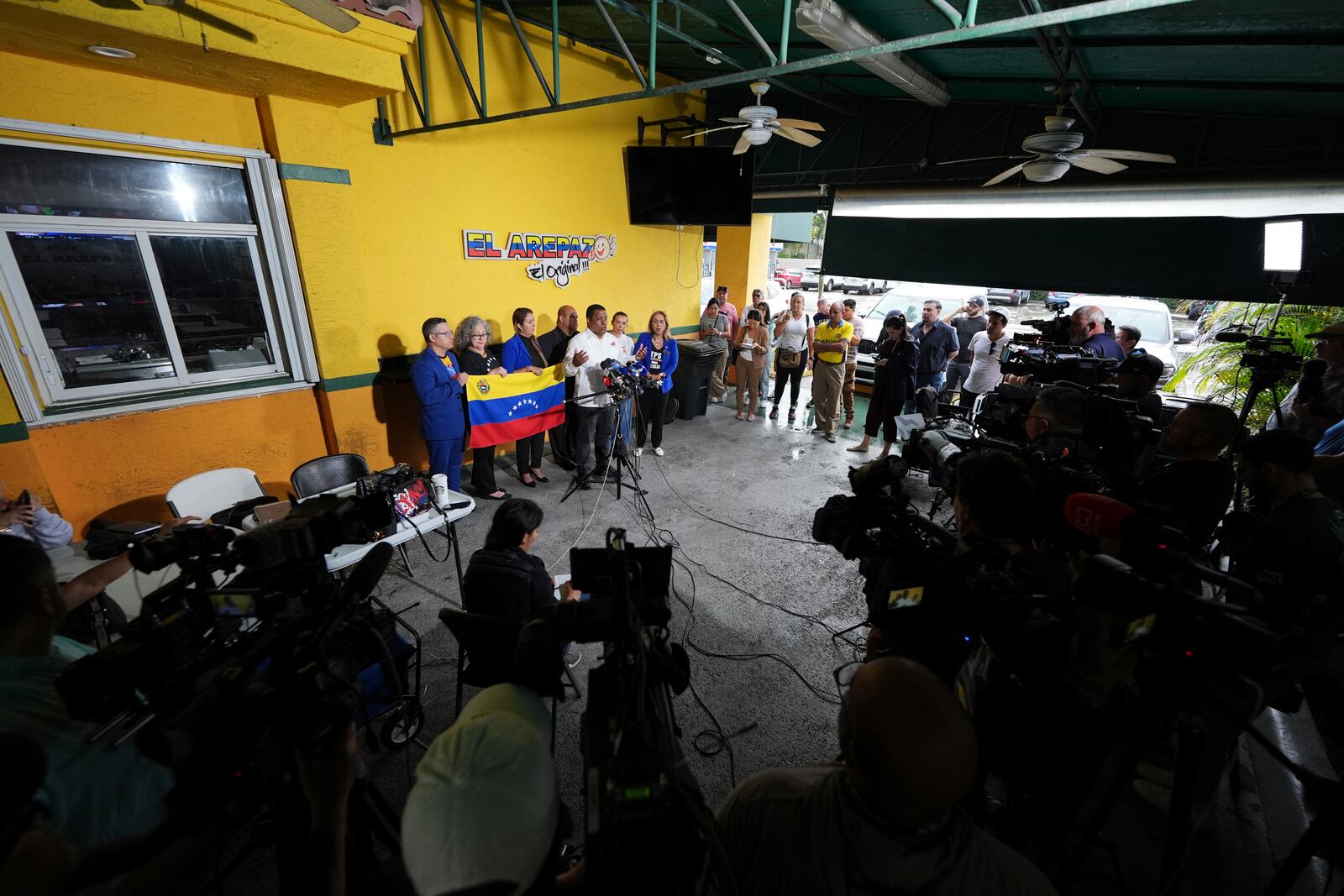 Venezuelan community leaders speak during a press conference to denounce changes to the protections that shielded hundreds of thousands of Venezuelans from deportation, Monday, Feb. 3, 2025, in Doral, Fla. (AP Photo/Rebecca Blackwell)