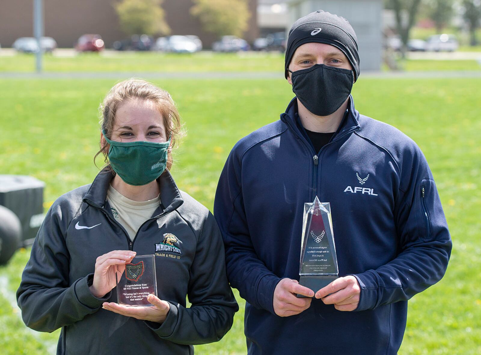 Sophia Angelopoulos, Air Force Research Laboratory assistant research chemist, and Wes Chapkin, AFRL research engineer, captured first place in the female and male categories April 15 at the All-Star Fitness Challenge on Wright-Patterson Air Force Base. U.S. AIR FORCE PHOTO/WESLEY FARNSWORTH