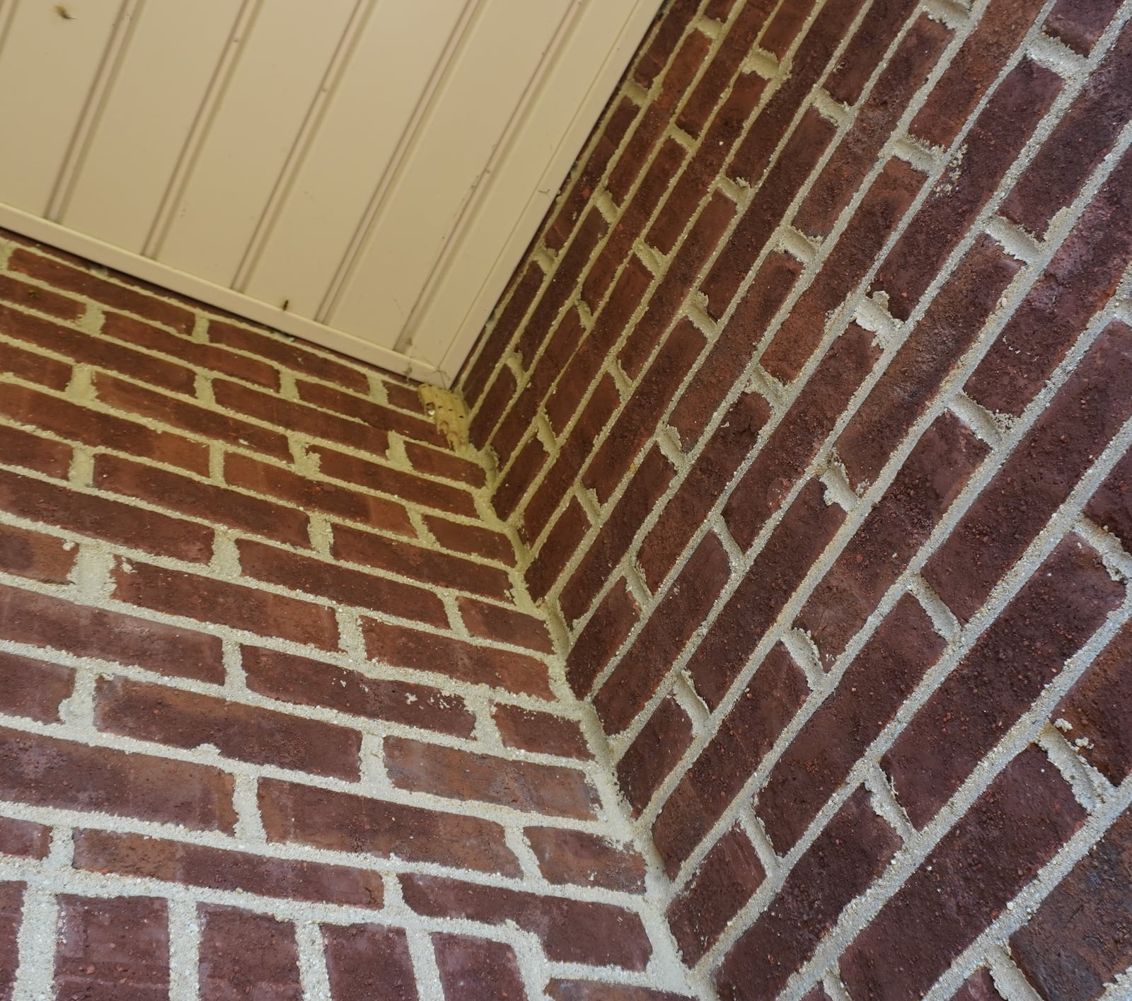 A mud dauber nest in the corner of an entrance to a home. CONTRIBUTED/PAMELA BENNETT