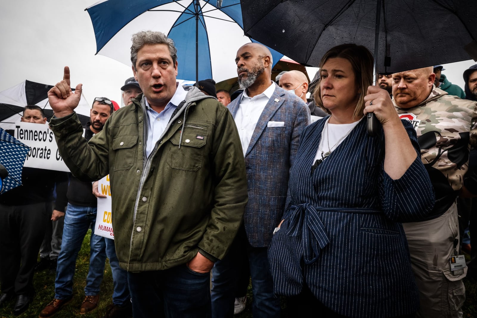 Ohio congressman, TIm Ryan. left, IUE-CWA president Carl Kennebrew, center, and Dayton mayor, Nan Whaley talk about Tenneco closing their plant in Kettering. JIM NOELKER/STAFF