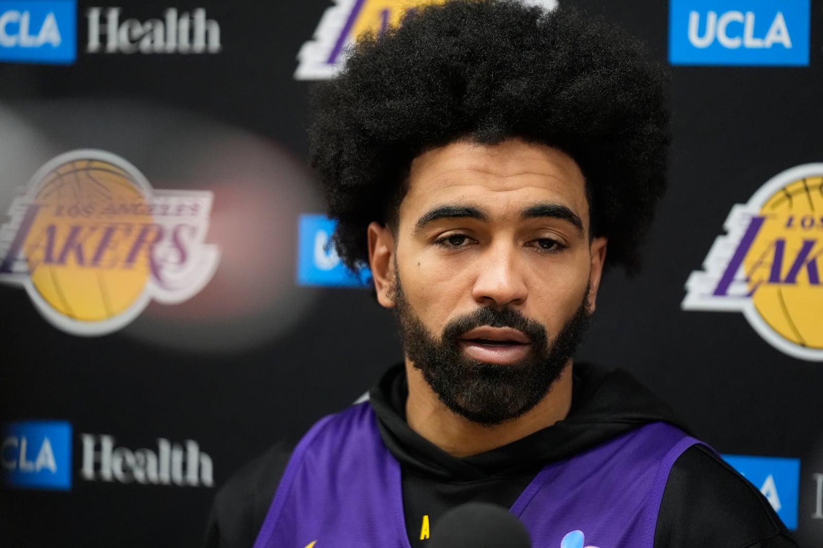 Los Angeles Lakers guard Gabe Vincent comments on the wildfires during an NBA basketball news conference at the UCLA Health Training Center in El Segundo, Calif., Friday, Jan. 10, 2025. (AP Photo/Damian Dovarganes)