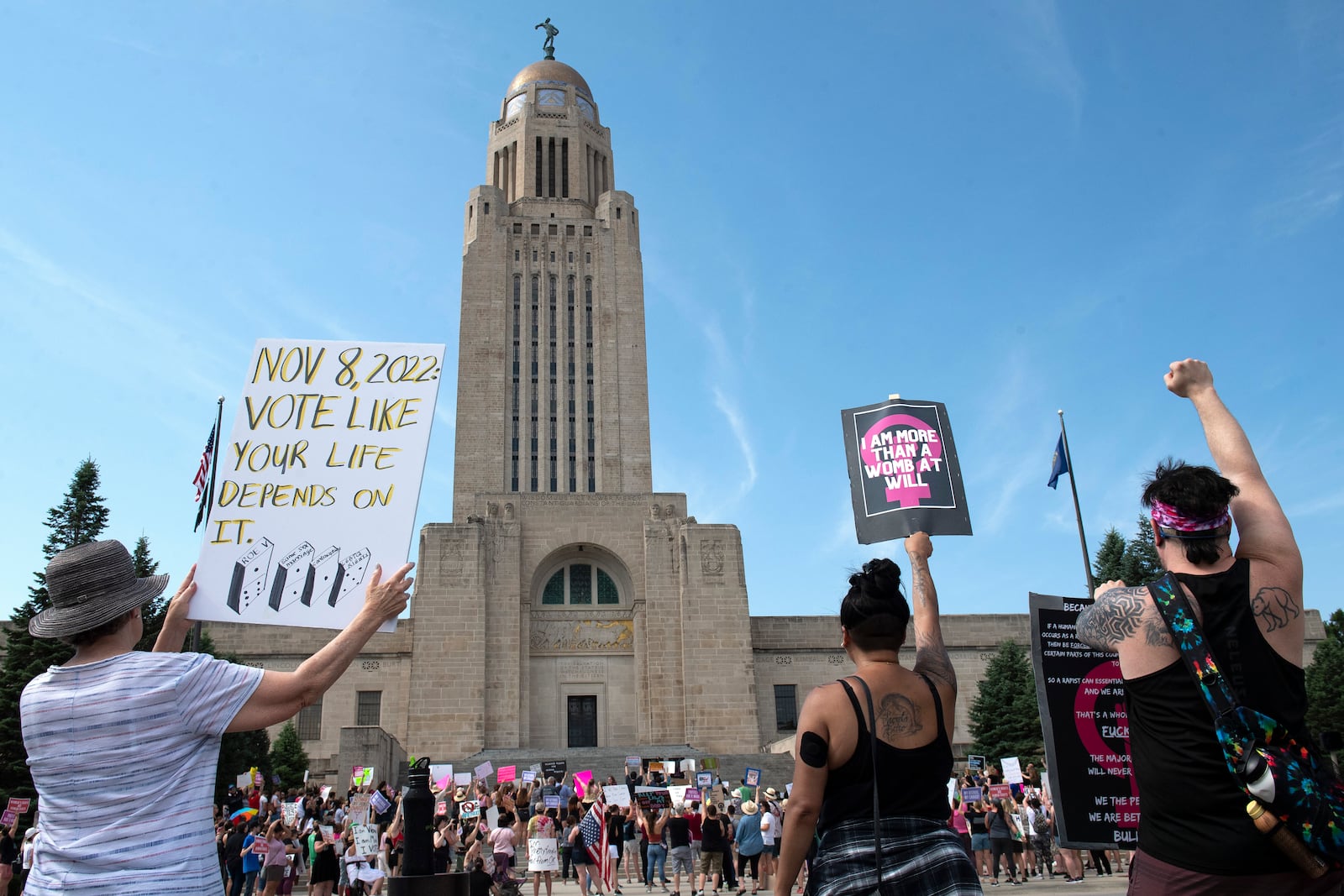 FILE - Protesters line the street around the front of the Nebraska Capitol during an Abortion Rights Rally, July 4, 2022, in Lincoln, Neb. (Kenneth Ferriera/Lincoln Journal Star via AP, File)