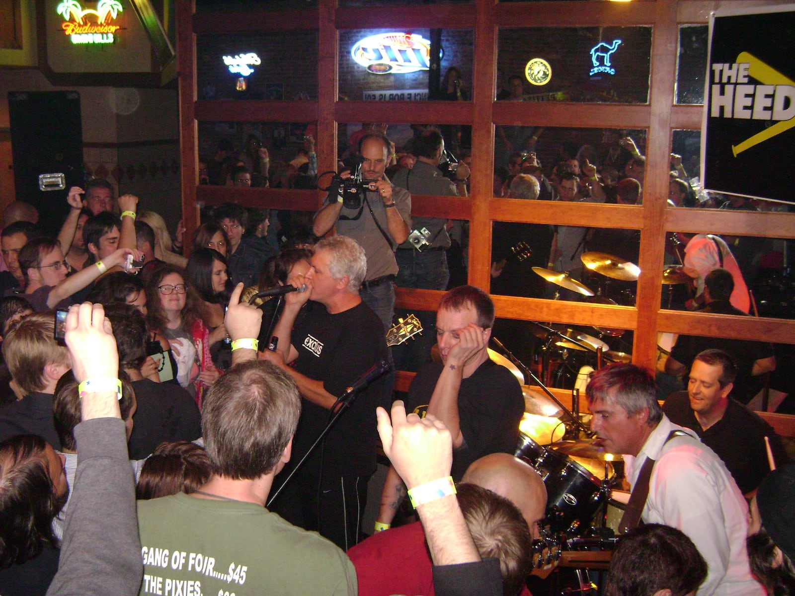 Robert Pollard (left to right) with Nate Farley, Greg Demos and Jim MacPherson, performing at Pollard’s 50th birthday bash at Bimini Bill’s in Dayton in October 2007. PHOTO BY DON THRASHER