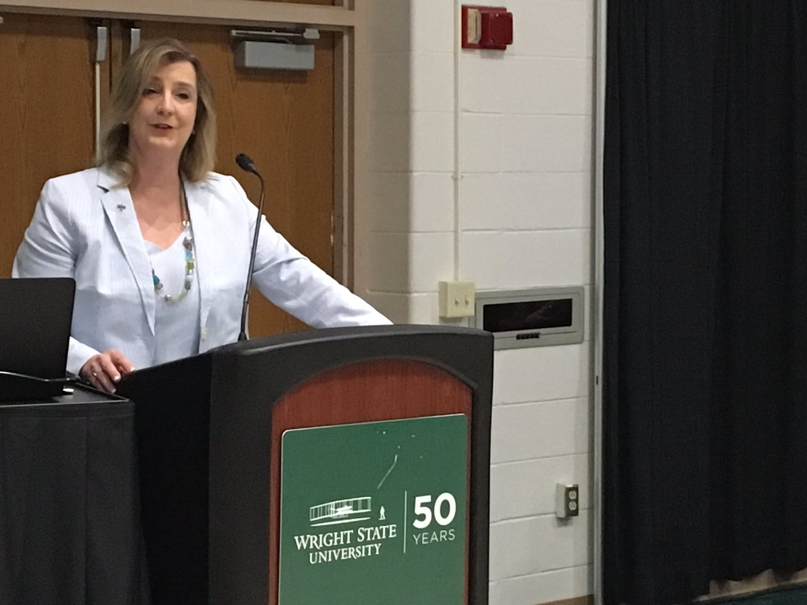 Wright State University president Cheryl Schrader begins presenting the fiscal year 2019 budget proposal to trustees on Friday. The budget projects a $10-million dip in revenue that could force WSU to lay off up to 40 employees.