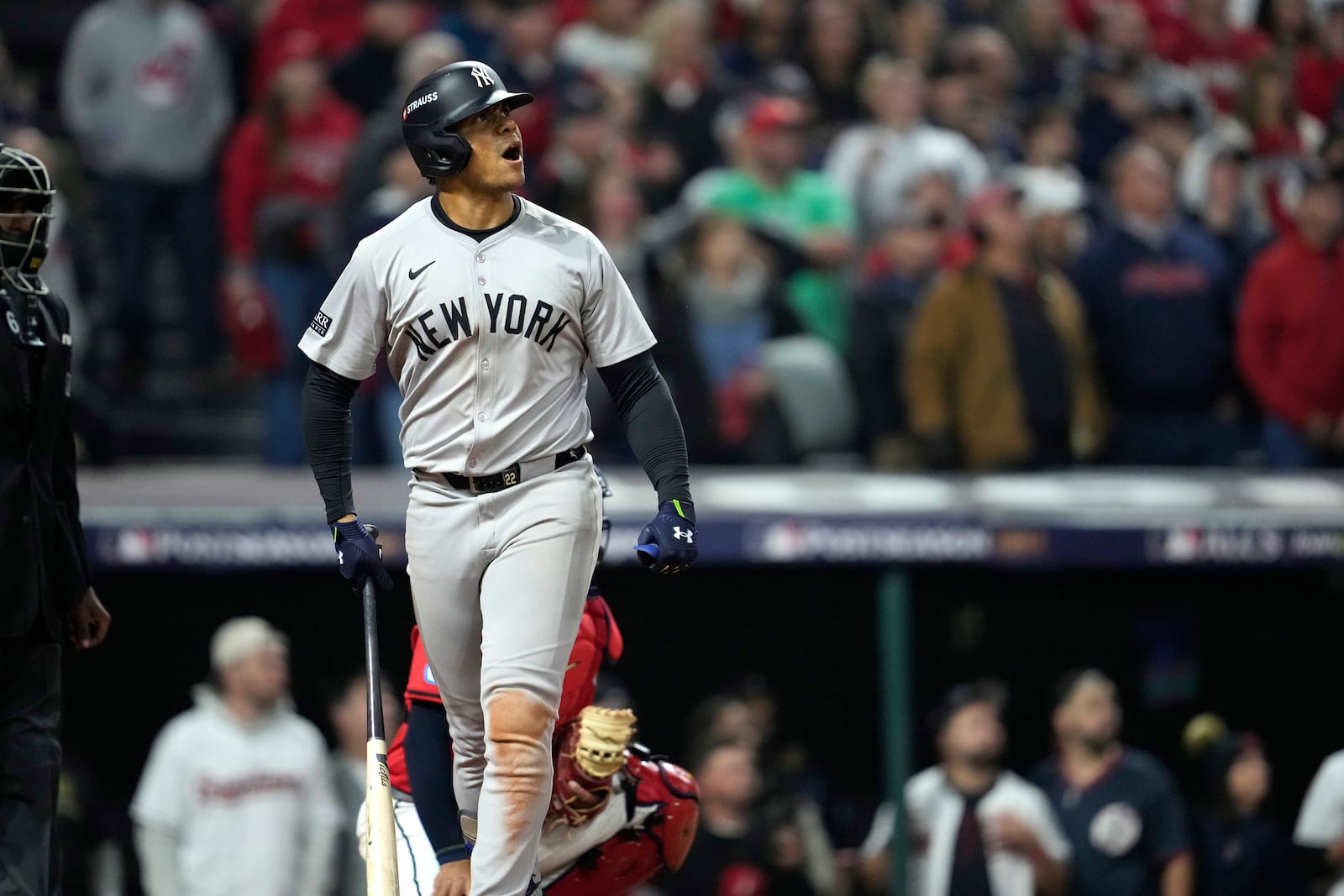 New York Yankees' Juan Soto watches his three-run home run against the Cleveland Guardians during the 10th inning in Game 5 of the baseball AL Championship Series Saturday, Oct. 19, 2024, in Cleveland. (AP Photo/Godofredo A. Vásquez)