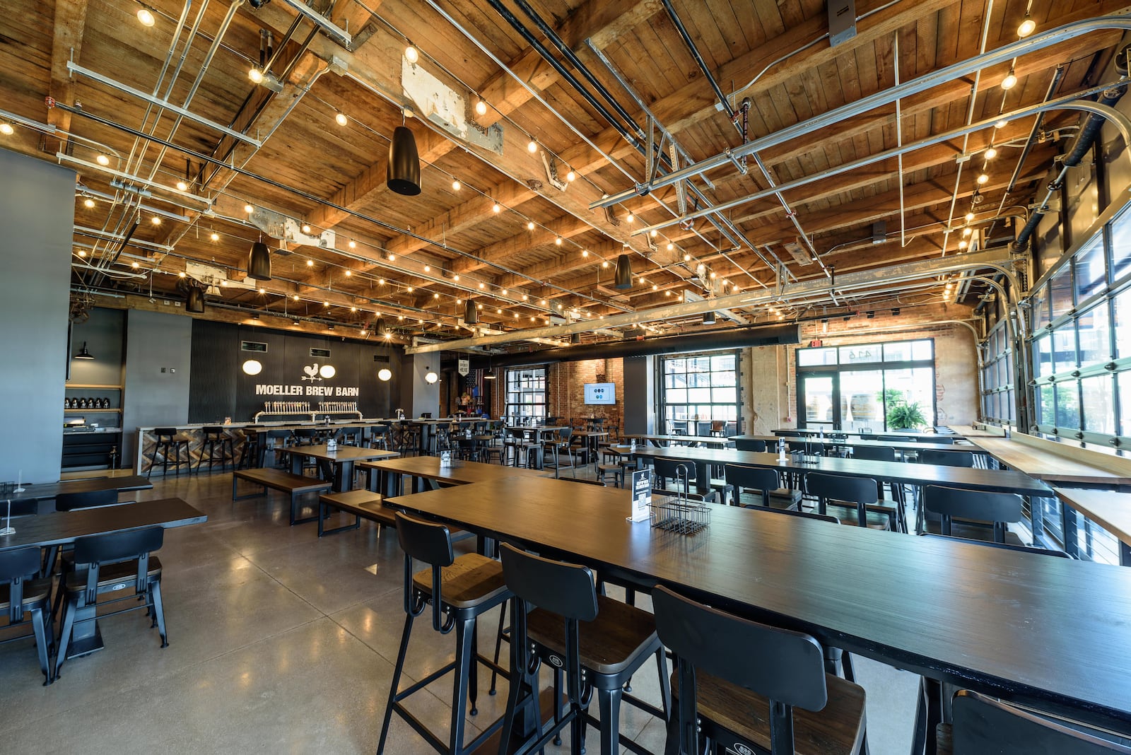 Here's a sneak peek at the new Moeller Brew Barn, located at 416 E. 1st St. in downtown Dayton. The taproom will open its doors with a grand opening celebration on Friday, Aug. 19, 2022 at 11 a.m. TOM GILLIAM / CONTRIBUTING PHOTOGRAPHER