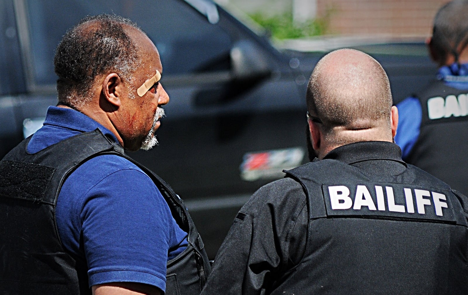 A bailiff was injured while attempting to serve an eviction notice at a Dayton house on Princeton Drive. (Marshall Gorby/Staff)