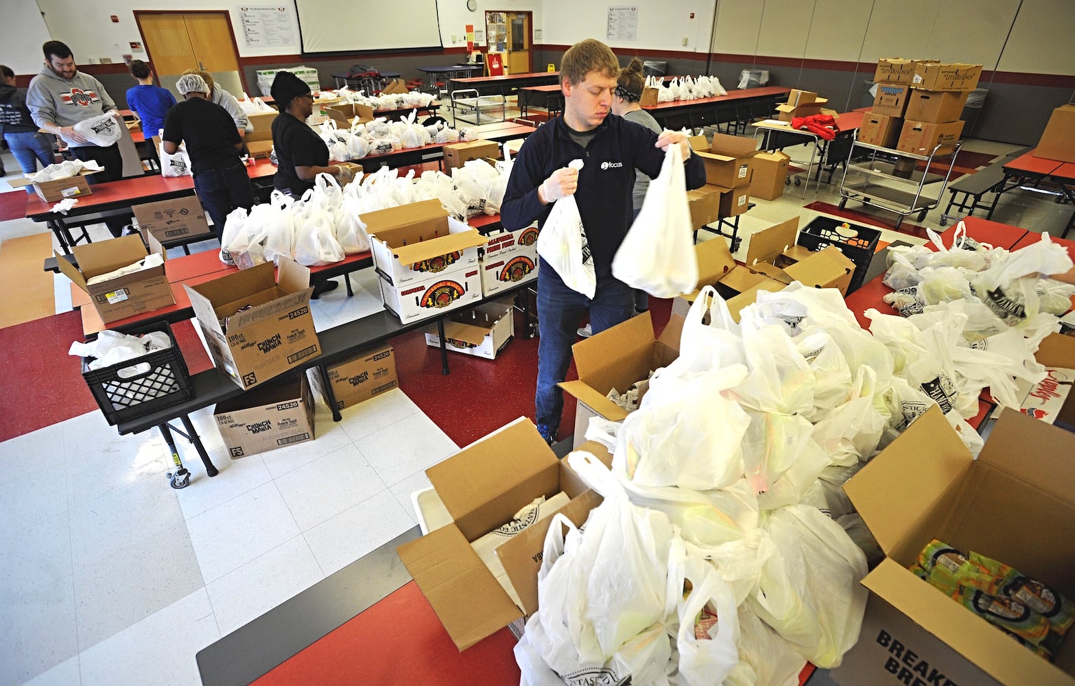 PHOTOS: Food distribution for Wright Brothers Middle School students