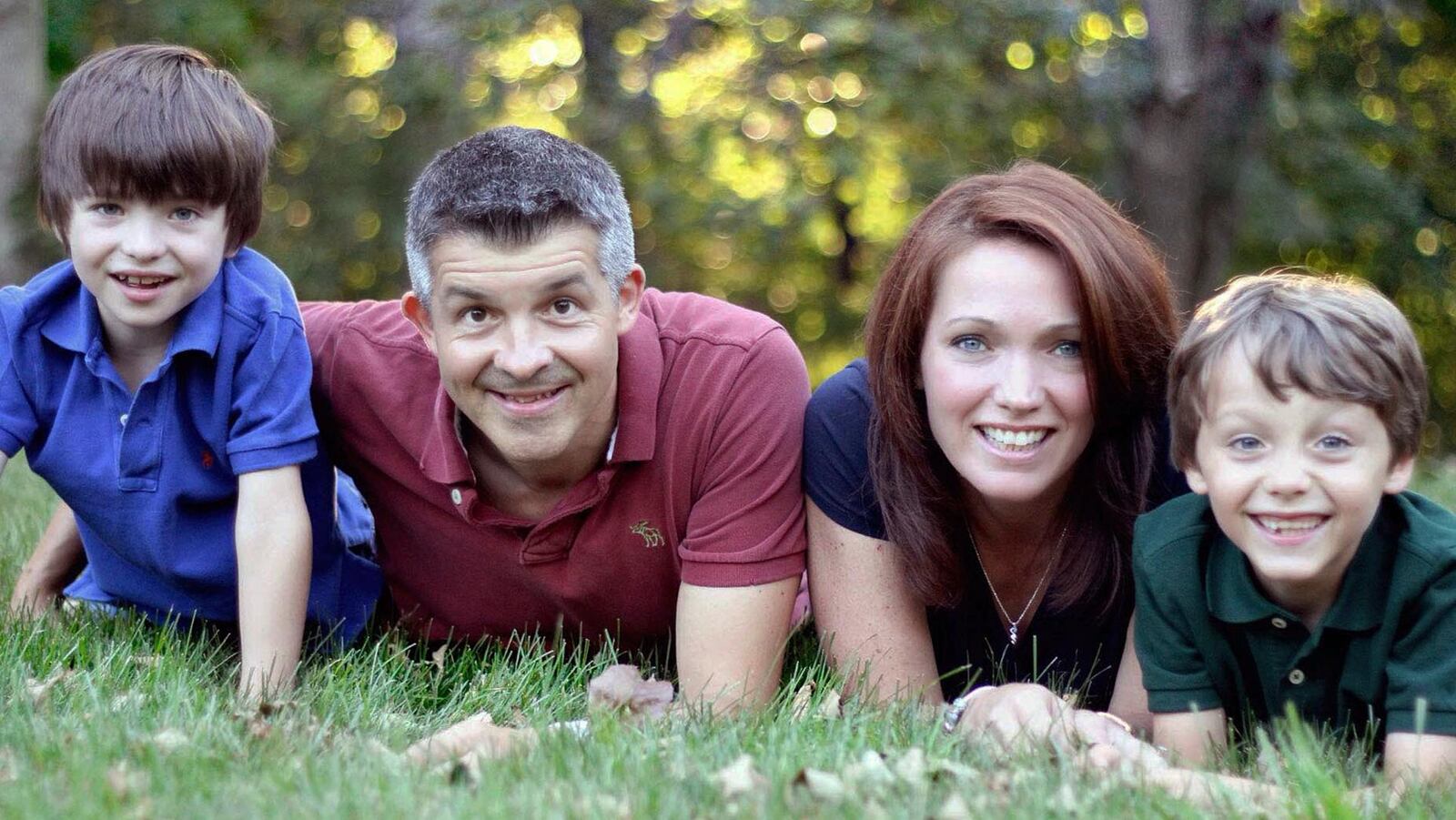 This undated family photo provided by Sandy Hook Promise shows sons Dylan, left, and Jake, right, with parents Ian and Nicole Hockley. Dylan was among those killed in the Sandy Hook Elementary School shooting on Dec. 14, 2012 in Newtown, Conn. The Hockley parents were co-founders of Sandy Hook Promise, a group that lobbied for mental health care changes and gun control legislation in the months after the shooting. (Nicole Hockley/Sandy Hook Promise via AP)