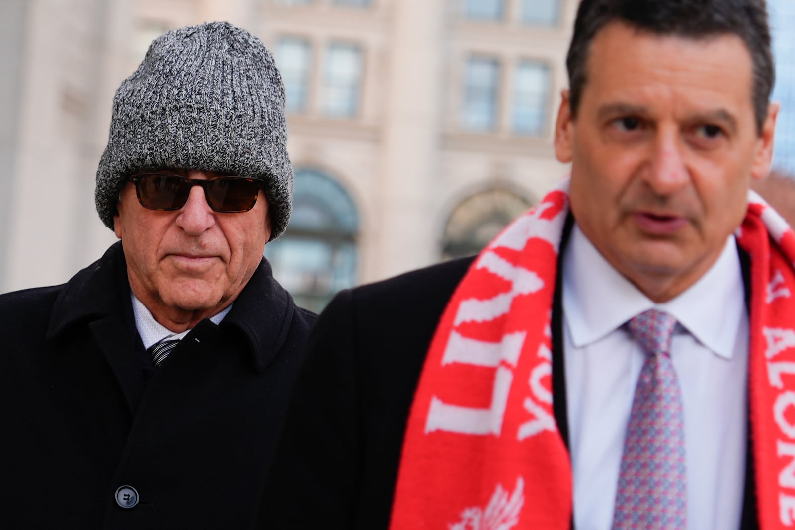 Erden Arkan, left, leaves federal court, Friday, Jan. 10, 2025, in New York, after pleading guilty to a charge alleging that he worked with a Turkish government official to funnel illegal campaign contributions to New York City Mayor Eric Adams. (AP Photo/Julia Demaree Nikhinson)